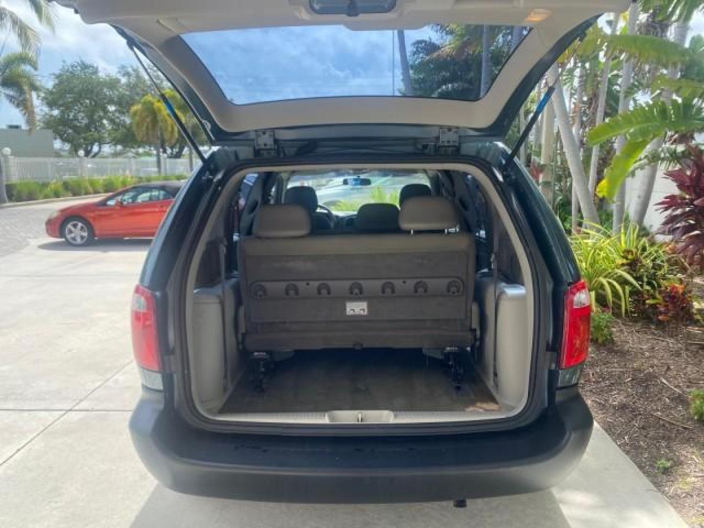 2007 Magnesium Pearl /Medium Slate Gray Dodge Caravan SE 1 OWNER LOW MILES 57,531 (1D4GP25B07B) with an 2.4L DOHC SMPI 16-Valve 4-Cyl Engine engine, Automatic transmission, located at 4701 North Dixie Hwy, Pompano Beach, FL, 33064, (954) 422-2889, 26.240938, -80.123474 - OUR WEBPAGE FLORIDACARS1.COM HAS OVER 100 PHOTOS AND FREE CARFAX LINK 2007 DODGE CARAVAN SE VIN: 1D4GP25B07B182994 1 D 4 G P 2 5 B 0 7 B 1 8 2 9 9 4 VAN 2.4L I4 F DOHC GASOLINE FRONT WHEEL DRIVE Top Features Cloth Seats Third Row Seat Basic Features AM/FM Stereo Air Conditioning Automatic Transmissi - Photo#76