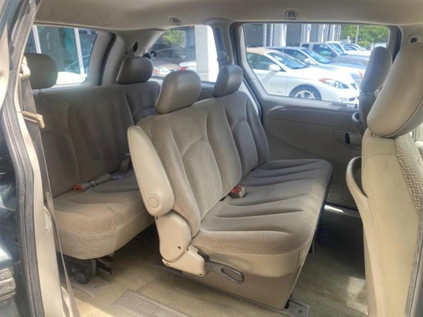 2007 Magnesium Pearl /Medium Slate Gray Dodge Caravan SE 1 OWNER LOW MILES 57,531 (1D4GP25B07B) with an 2.4L DOHC SMPI 16-Valve 4-Cyl Engine engine, Automatic transmission, located at 4701 North Dixie Hwy, Pompano Beach, FL, 33064, (954) 422-2889, 26.240938, -80.123474 - OUR WEBPAGE FLORIDACARS1.COM HAS OVER 100 PHOTOS AND FREE CARFAX LINK 2007 DODGE CARAVAN SE VIN: 1D4GP25B07B182994 1 D 4 G P 2 5 B 0 7 B 1 8 2 9 9 4 VAN 2.4L I4 F DOHC GASOLINE FRONT WHEEL DRIVE Top Features Cloth Seats Third Row Seat Basic Features AM/FM Stereo Air Conditioning Automatic Transmissi - Photo#83
