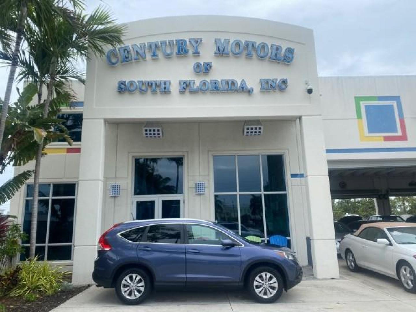 2014 Twilight Blue Metallic /Gray Honda CR-V EX-L LOW MILES 27,328 1 OWNER (2HKRM3H72EH) with an 2.4L I-4 16-Valve DOHC i-VTEC Engine engine, Automatic transmission, located at 4701 North Dixie Hwy, Pompano Beach, FL, 33064, (954) 422-2889, 26.240938, -80.123474 - OUR WEBPAGE FLORIDACARS1.COM HAS OVER 100 PHOTOS AND FREE CARFAX LINK 2014 HONDA CR-V EX-L VIN: 2HKRM3H72EH534254 2 H K R M 3 H 7 2 E H 5 3 4 2 5 4 4 DOOR WAGON/SPORT UTILITY 2.4L I4 F DOHC 16V GASOLINE FRONT WHEEL DRIVE Top Features Alloy Wheels Bluetooth Technology Front Seat Heaters Leather Seats - Photo#0