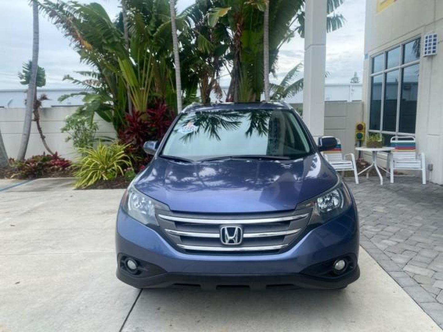 2014 Twilight Blue Metallic /Gray Honda CR-V EX-L LOW MILES 27,328 1 OWNER (2HKRM3H72EH) with an 2.4L I-4 16-Valve DOHC i-VTEC Engine engine, Automatic transmission, located at 4701 North Dixie Hwy, Pompano Beach, FL, 33064, (954) 422-2889, 26.240938, -80.123474 - OUR WEBPAGE FLORIDACARS1.COM HAS OVER 100 PHOTOS AND FREE CARFAX LINK 2014 HONDA CR-V EX-L VIN: 2HKRM3H72EH534254 2 H K R M 3 H 7 2 E H 5 3 4 2 5 4 4 DOOR WAGON/SPORT UTILITY 2.4L I4 F DOHC 16V GASOLINE FRONT WHEEL DRIVE Top Features Alloy Wheels Bluetooth Technology Front Seat Heaters Leather Seats - Photo#2