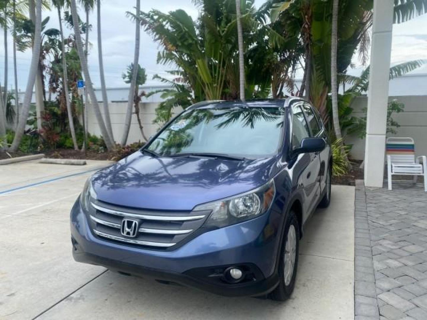 2014 Twilight Blue Metallic /Gray Honda CR-V EX-L LOW MILES 27,328 1 OWNER (2HKRM3H72EH) with an 2.4L I-4 16-Valve DOHC i-VTEC Engine engine, Automatic transmission, located at 4701 North Dixie Hwy, Pompano Beach, FL, 33064, (954) 422-2889, 26.240938, -80.123474 - OUR WEBPAGE FLORIDACARS1.COM HAS OVER 100 PHOTOS AND FREE CARFAX LINK 2014 HONDA CR-V EX-L VIN: 2HKRM3H72EH534254 2 H K R M 3 H 7 2 E H 5 3 4 2 5 4 4 DOOR WAGON/SPORT UTILITY 2.4L I4 F DOHC 16V GASOLINE FRONT WHEEL DRIVE Top Features Alloy Wheels Bluetooth Technology Front Seat Heaters Leather Seats - Photo#3