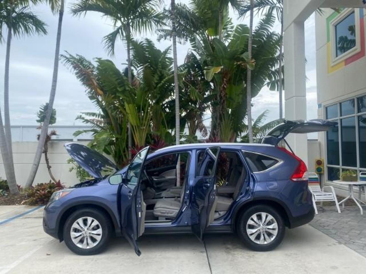 2014 Twilight Blue Metallic /Gray Honda CR-V EX-L LOW MILES 27,328 1 OWNER (2HKRM3H72EH) with an 2.4L I-4 16-Valve DOHC i-VTEC Engine engine, Automatic transmission, located at 4701 North Dixie Hwy, Pompano Beach, FL, 33064, (954) 422-2889, 26.240938, -80.123474 - OUR WEBPAGE FLORIDACARS1.COM HAS OVER 100 PHOTOS AND FREE CARFAX LINK 2014 HONDA CR-V EX-L VIN: 2HKRM3H72EH534254 2 H K R M 3 H 7 2 E H 5 3 4 2 5 4 4 DOOR WAGON/SPORT UTILITY 2.4L I4 F DOHC 16V GASOLINE FRONT WHEEL DRIVE Top Features Alloy Wheels Bluetooth Technology Front Seat Heaters Leather Seats - Photo#8