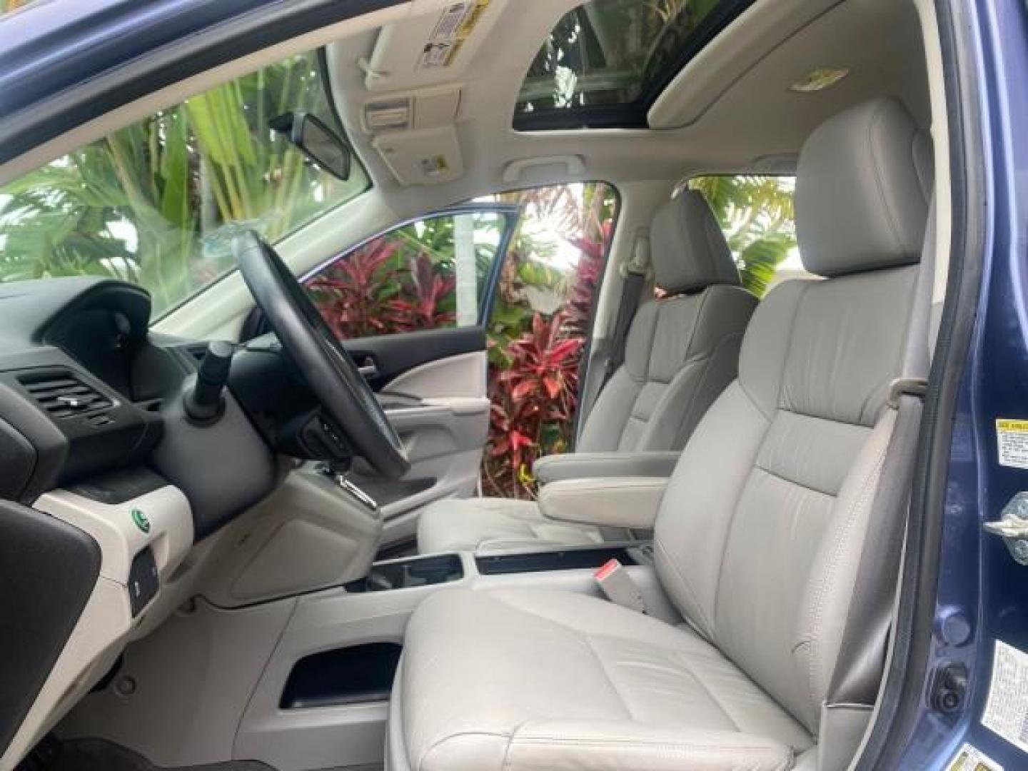 2014 Twilight Blue Metallic /Gray Honda CR-V EX-L LOW MILES 27,328 1 OWNER (2HKRM3H72EH) with an 2.4L I-4 16-Valve DOHC i-VTEC Engine engine, Automatic transmission, located at 4701 North Dixie Hwy, Pompano Beach, FL, 33064, (954) 422-2889, 26.240938, -80.123474 - OUR WEBPAGE FLORIDACARS1.COM HAS OVER 100 PHOTOS AND FREE CARFAX LINK 2014 HONDA CR-V EX-L VIN: 2HKRM3H72EH534254 2 H K R M 3 H 7 2 E H 5 3 4 2 5 4 4 DOOR WAGON/SPORT UTILITY 2.4L I4 F DOHC 16V GASOLINE FRONT WHEEL DRIVE Top Features Alloy Wheels Bluetooth Technology Front Seat Heaters Leather Seats - Photo#10