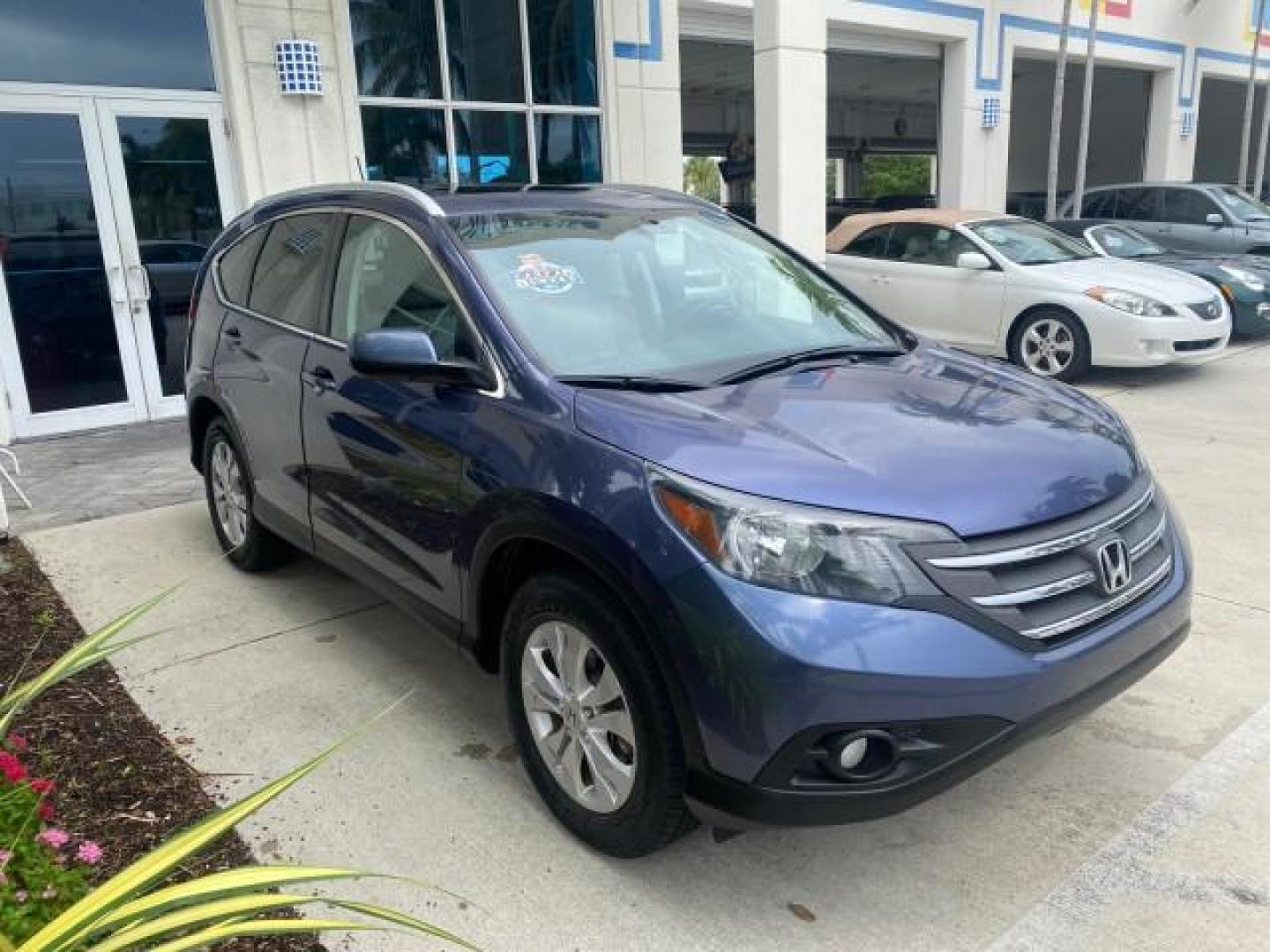 2014 Twilight Blue Metallic /Gray Honda CR-V EX-L LOW MILES 27,328 1 OWNER (2HKRM3H72EH) with an 2.4L I-4 16-Valve DOHC i-VTEC Engine engine, Automatic transmission, located at 4701 North Dixie Hwy, Pompano Beach, FL, 33064, (954) 422-2889, 26.240938, -80.123474 - OUR WEBPAGE FLORIDACARS1.COM HAS OVER 100 PHOTOS AND FREE CARFAX LINK 2014 HONDA CR-V EX-L VIN: 2HKRM3H72EH534254 2 H K R M 3 H 7 2 E H 5 3 4 2 5 4 4 DOOR WAGON/SPORT UTILITY 2.4L I4 F DOHC 16V GASOLINE FRONT WHEEL DRIVE Top Features Alloy Wheels Bluetooth Technology Front Seat Heaters Leather Seats - Photo#24