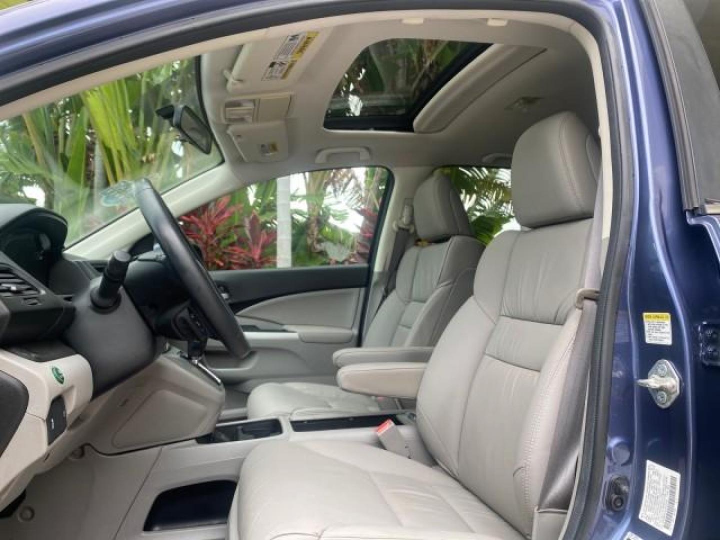 2014 Twilight Blue Metallic /Gray Honda CR-V EX-L LOW MILES 27,328 1 OWNER (2HKRM3H72EH) with an 2.4L I-4 16-Valve DOHC i-VTEC Engine engine, Automatic transmission, located at 4701 North Dixie Hwy, Pompano Beach, FL, 33064, (954) 422-2889, 26.240938, -80.123474 - OUR WEBPAGE FLORIDACARS1.COM HAS OVER 100 PHOTOS AND FREE CARFAX LINK 2014 HONDA CR-V EX-L VIN: 2HKRM3H72EH534254 2 H K R M 3 H 7 2 E H 5 3 4 2 5 4 4 DOOR WAGON/SPORT UTILITY 2.4L I4 F DOHC 16V GASOLINE FRONT WHEEL DRIVE Top Features Alloy Wheels Bluetooth Technology Front Seat Heaters Leather Seats - Photo#33