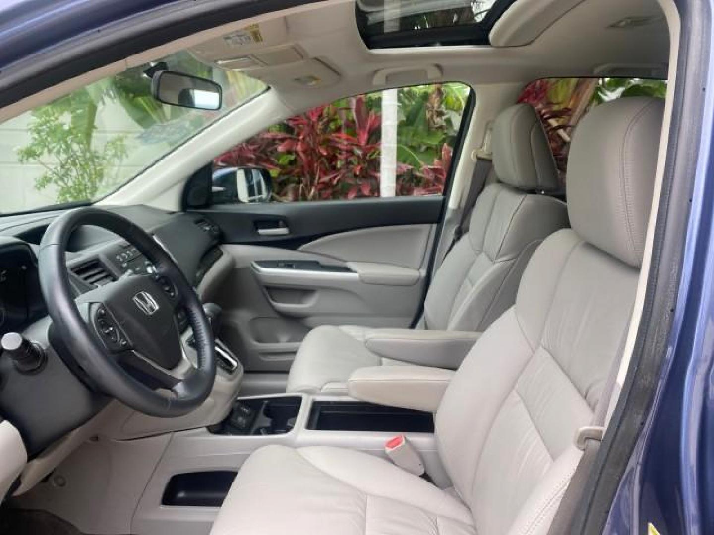2014 Twilight Blue Metallic /Gray Honda CR-V EX-L LOW MILES 27,328 1 OWNER (2HKRM3H72EH) with an 2.4L I-4 16-Valve DOHC i-VTEC Engine engine, Automatic transmission, located at 4701 North Dixie Hwy, Pompano Beach, FL, 33064, (954) 422-2889, 26.240938, -80.123474 - OUR WEBPAGE FLORIDACARS1.COM HAS OVER 100 PHOTOS AND FREE CARFAX LINK 2014 HONDA CR-V EX-L VIN: 2HKRM3H72EH534254 2 H K R M 3 H 7 2 E H 5 3 4 2 5 4 4 DOOR WAGON/SPORT UTILITY 2.4L I4 F DOHC 16V GASOLINE FRONT WHEEL DRIVE Top Features Alloy Wheels Bluetooth Technology Front Seat Heaters Leather Seats - Photo#34