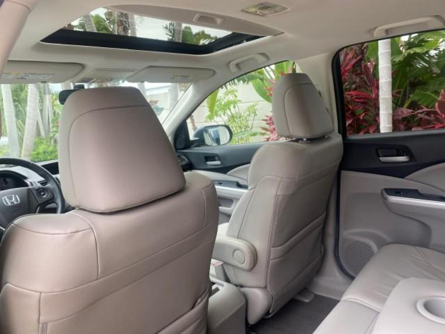 2014 Twilight Blue Metallic /Gray Honda CR-V EX-L LOW MILES 27,328 1 OWNER (2HKRM3H72EH) with an 2.4L I-4 16-Valve DOHC i-VTEC Engine engine, Automatic transmission, located at 4701 North Dixie Hwy, Pompano Beach, FL, 33064, (954) 422-2889, 26.240938, -80.123474 - OUR WEBPAGE FLORIDACARS1.COM HAS OVER 100 PHOTOS AND FREE CARFAX LINK 2014 HONDA CR-V EX-L VIN: 2HKRM3H72EH534254 2 H K R M 3 H 7 2 E H 5 3 4 2 5 4 4 DOOR WAGON/SPORT UTILITY 2.4L I4 F DOHC 16V GASOLINE FRONT WHEEL DRIVE Top Features Alloy Wheels Bluetooth Technology Front Seat Heaters Leather Seats - Photo#71