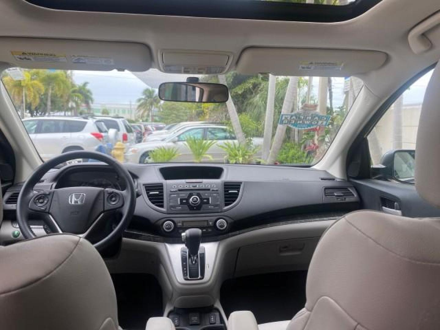 2014 Twilight Blue Metallic /Gray Honda CR-V EX-L LOW MILES 27,328 1 OWNER (2HKRM3H72EH) with an 2.4L I-4 16-Valve DOHC i-VTEC Engine engine, Automatic transmission, located at 4701 North Dixie Hwy, Pompano Beach, FL, 33064, (954) 422-2889, 26.240938, -80.123474 - OUR WEBPAGE FLORIDACARS1.COM HAS OVER 100 PHOTOS AND FREE CARFAX LINK 2014 HONDA CR-V EX-L VIN: 2HKRM3H72EH534254 2 H K R M 3 H 7 2 E H 5 3 4 2 5 4 4 DOOR WAGON/SPORT UTILITY 2.4L I4 F DOHC 16V GASOLINE FRONT WHEEL DRIVE Top Features Alloy Wheels Bluetooth Technology Front Seat Heaters Leather Seats - Photo#73
