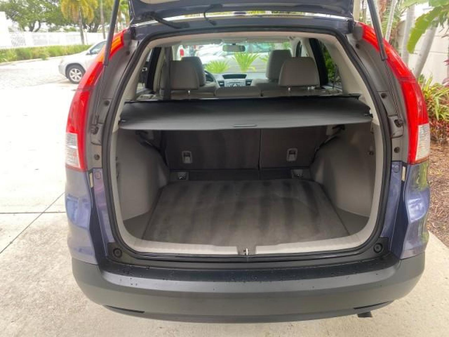 2014 Twilight Blue Metallic /Gray Honda CR-V EX-L LOW MILES 27,328 1 OWNER (2HKRM3H72EH) with an 2.4L I-4 16-Valve DOHC i-VTEC Engine engine, Automatic transmission, located at 4701 North Dixie Hwy, Pompano Beach, FL, 33064, (954) 422-2889, 26.240938, -80.123474 - OUR WEBPAGE FLORIDACARS1.COM HAS OVER 100 PHOTOS AND FREE CARFAX LINK 2014 HONDA CR-V EX-L VIN: 2HKRM3H72EH534254 2 H K R M 3 H 7 2 E H 5 3 4 2 5 4 4 DOOR WAGON/SPORT UTILITY 2.4L I4 F DOHC 16V GASOLINE FRONT WHEEL DRIVE Top Features Alloy Wheels Bluetooth Technology Front Seat Heaters Leather Seats - Photo#86