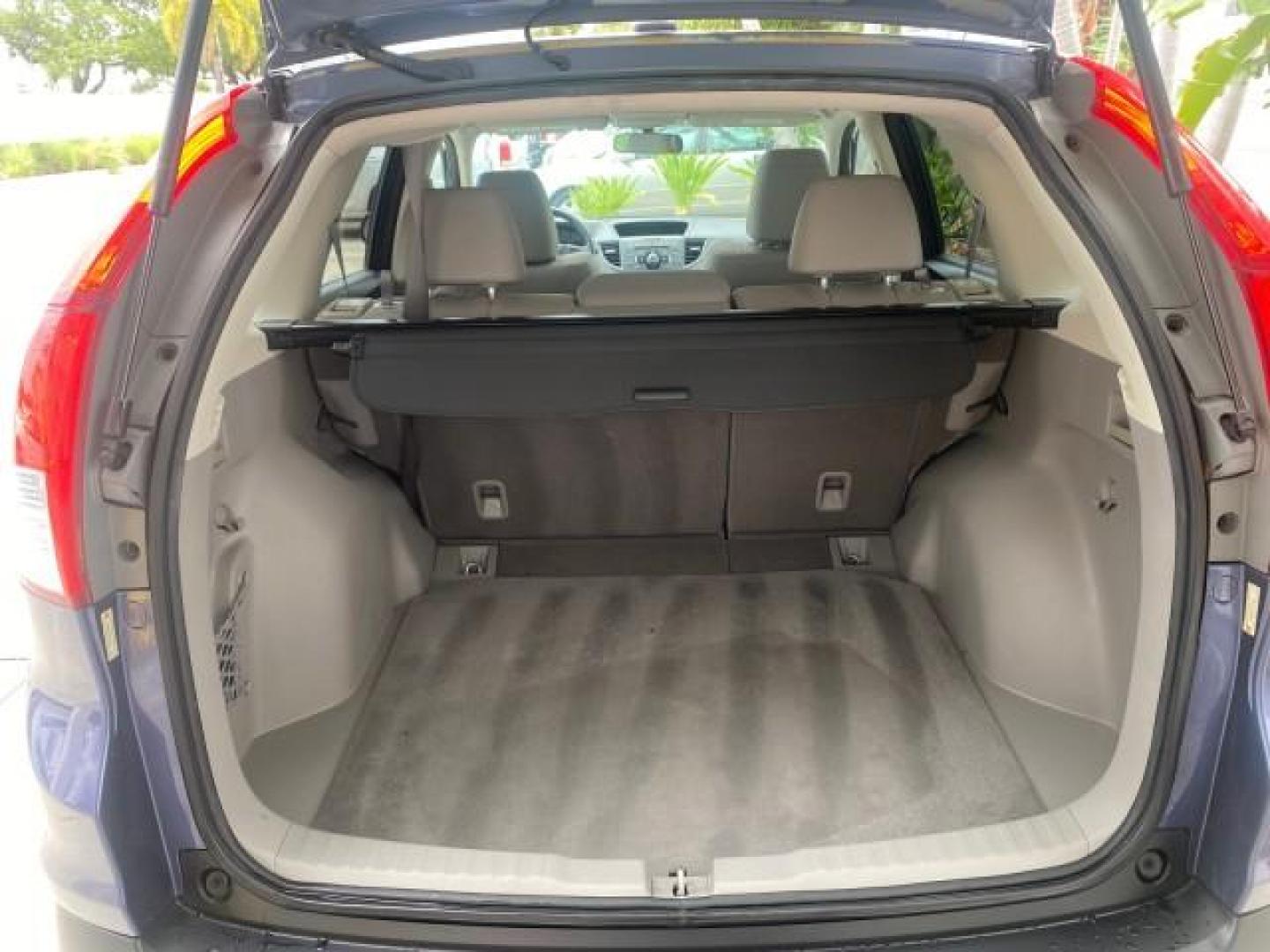 2014 Twilight Blue Metallic /Gray Honda CR-V EX-L LOW MILES 27,328 1 OWNER (2HKRM3H72EH) with an 2.4L I-4 16-Valve DOHC i-VTEC Engine engine, Automatic transmission, located at 4701 North Dixie Hwy, Pompano Beach, FL, 33064, (954) 422-2889, 26.240938, -80.123474 - OUR WEBPAGE FLORIDACARS1.COM HAS OVER 100 PHOTOS AND FREE CARFAX LINK 2014 HONDA CR-V EX-L VIN: 2HKRM3H72EH534254 2 H K R M 3 H 7 2 E H 5 3 4 2 5 4 4 DOOR WAGON/SPORT UTILITY 2.4L I4 F DOHC 16V GASOLINE FRONT WHEEL DRIVE Top Features Alloy Wheels Bluetooth Technology Front Seat Heaters Leather Seats - Photo#88