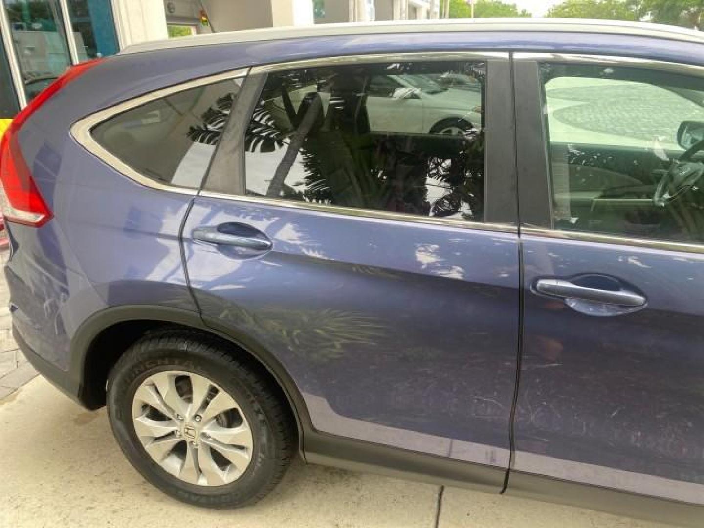 2014 Twilight Blue Metallic /Gray Honda CR-V EX-L LOW MILES 27,328 1 OWNER (2HKRM3H72EH) with an 2.4L I-4 16-Valve DOHC i-VTEC Engine engine, Automatic transmission, located at 4701 North Dixie Hwy, Pompano Beach, FL, 33064, (954) 422-2889, 26.240938, -80.123474 - OUR WEBPAGE FLORIDACARS1.COM HAS OVER 100 PHOTOS AND FREE CARFAX LINK 2014 HONDA CR-V EX-L VIN: 2HKRM3H72EH534254 2 H K R M 3 H 7 2 E H 5 3 4 2 5 4 4 DOOR WAGON/SPORT UTILITY 2.4L I4 F DOHC 16V GASOLINE FRONT WHEEL DRIVE Top Features Alloy Wheels Bluetooth Technology Front Seat Heaters Leather Seats - Photo#91
