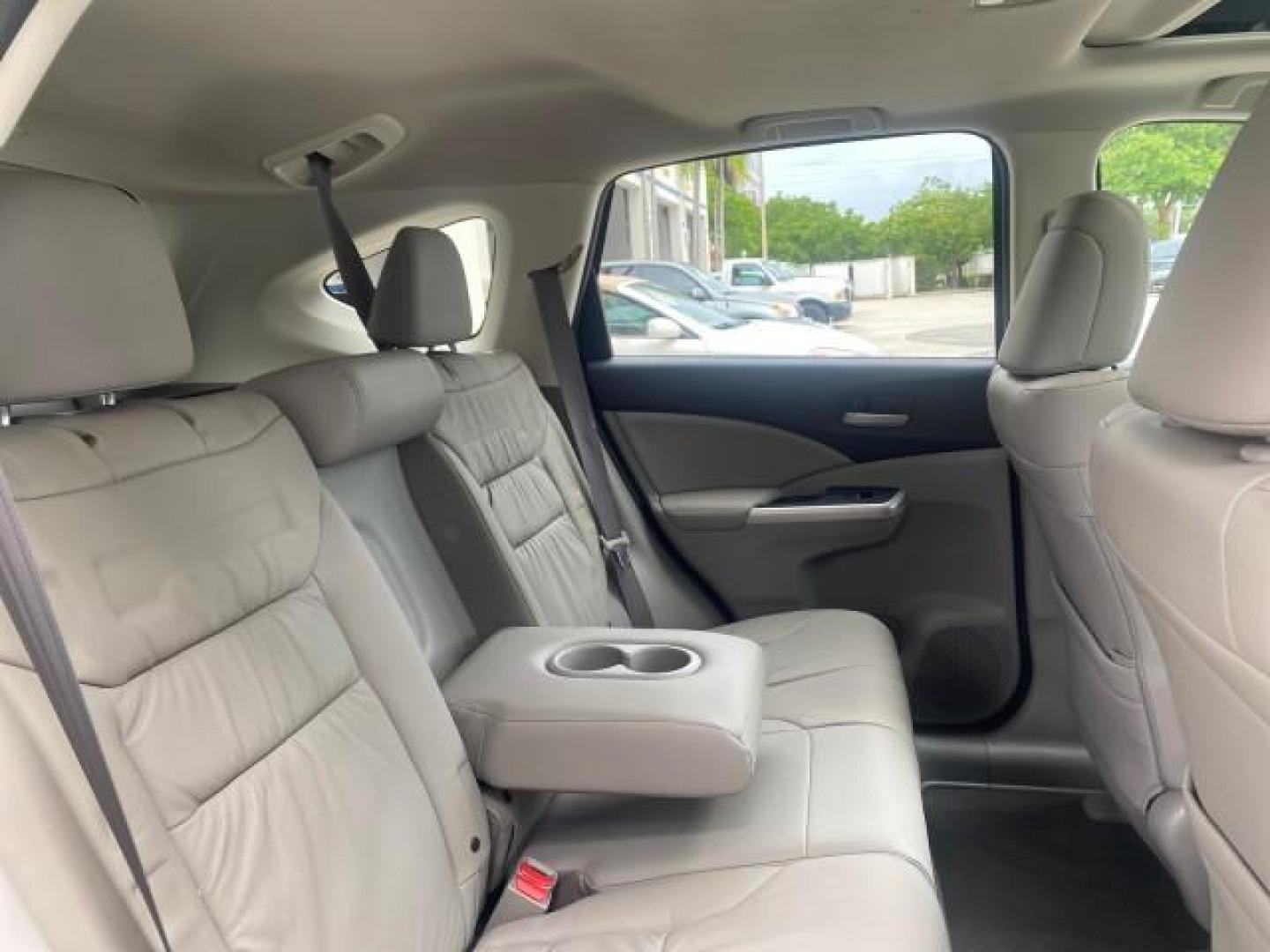 2014 Twilight Blue Metallic /Gray Honda CR-V EX-L LOW MILES 27,328 1 OWNER (2HKRM3H72EH) with an 2.4L I-4 16-Valve DOHC i-VTEC Engine engine, Automatic transmission, located at 4701 North Dixie Hwy, Pompano Beach, FL, 33064, (954) 422-2889, 26.240938, -80.123474 - OUR WEBPAGE FLORIDACARS1.COM HAS OVER 100 PHOTOS AND FREE CARFAX LINK 2014 HONDA CR-V EX-L VIN: 2HKRM3H72EH534254 2 H K R M 3 H 7 2 E H 5 3 4 2 5 4 4 DOOR WAGON/SPORT UTILITY 2.4L I4 F DOHC 16V GASOLINE FRONT WHEEL DRIVE Top Features Alloy Wheels Bluetooth Technology Front Seat Heaters Leather Seats - Photo#94