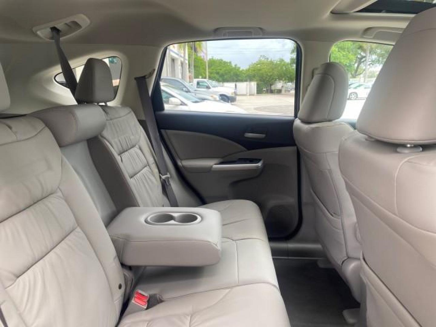 2014 Twilight Blue Metallic /Gray Honda CR-V EX-L LOW MILES 27,328 1 OWNER (2HKRM3H72EH) with an 2.4L I-4 16-Valve DOHC i-VTEC Engine engine, Automatic transmission, located at 4701 North Dixie Hwy, Pompano Beach, FL, 33064, (954) 422-2889, 26.240938, -80.123474 - OUR WEBPAGE FLORIDACARS1.COM HAS OVER 100 PHOTOS AND FREE CARFAX LINK 2014 HONDA CR-V EX-L VIN: 2HKRM3H72EH534254 2 H K R M 3 H 7 2 E H 5 3 4 2 5 4 4 DOOR WAGON/SPORT UTILITY 2.4L I4 F DOHC 16V GASOLINE FRONT WHEEL DRIVE Top Features Alloy Wheels Bluetooth Technology Front Seat Heaters Leather Seats - Photo#95