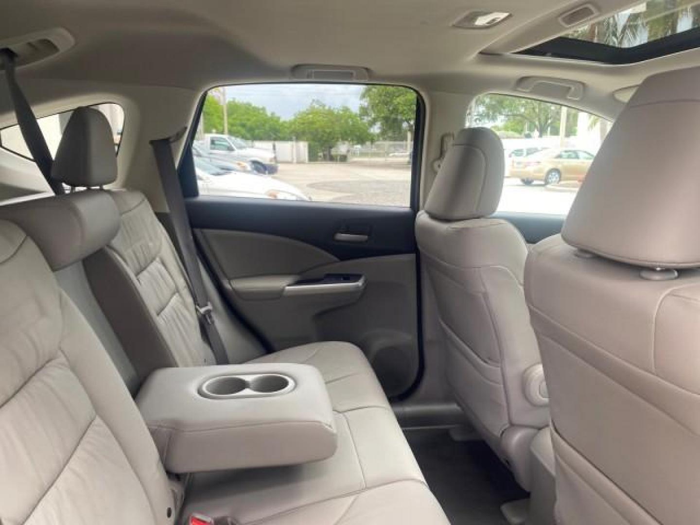 2014 Twilight Blue Metallic /Gray Honda CR-V EX-L LOW MILES 27,328 1 OWNER (2HKRM3H72EH) with an 2.4L I-4 16-Valve DOHC i-VTEC Engine engine, Automatic transmission, located at 4701 North Dixie Hwy, Pompano Beach, FL, 33064, (954) 422-2889, 26.240938, -80.123474 - OUR WEBPAGE FLORIDACARS1.COM HAS OVER 100 PHOTOS AND FREE CARFAX LINK 2014 HONDA CR-V EX-L VIN: 2HKRM3H72EH534254 2 H K R M 3 H 7 2 E H 5 3 4 2 5 4 4 DOOR WAGON/SPORT UTILITY 2.4L I4 F DOHC 16V GASOLINE FRONT WHEEL DRIVE Top Features Alloy Wheels Bluetooth Technology Front Seat Heaters Leather Seats - Photo#96