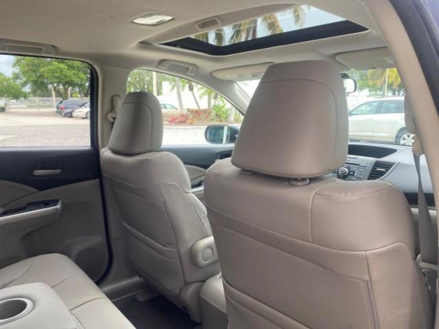 2014 Twilight Blue Metallic /Gray Honda CR-V EX-L LOW MILES 27,328 1 OWNER (2HKRM3H72EH) with an 2.4L I-4 16-Valve DOHC i-VTEC Engine engine, Automatic transmission, located at 4701 North Dixie Hwy, Pompano Beach, FL, 33064, (954) 422-2889, 26.240938, -80.123474 - OUR WEBPAGE FLORIDACARS1.COM HAS OVER 100 PHOTOS AND FREE CARFAX LINK 2014 HONDA CR-V EX-L VIN: 2HKRM3H72EH534254 2 H K R M 3 H 7 2 E H 5 3 4 2 5 4 4 DOOR WAGON/SPORT UTILITY 2.4L I4 F DOHC 16V GASOLINE FRONT WHEEL DRIVE Top Features Alloy Wheels Bluetooth Technology Front Seat Heaters Leather Seats - Photo#97