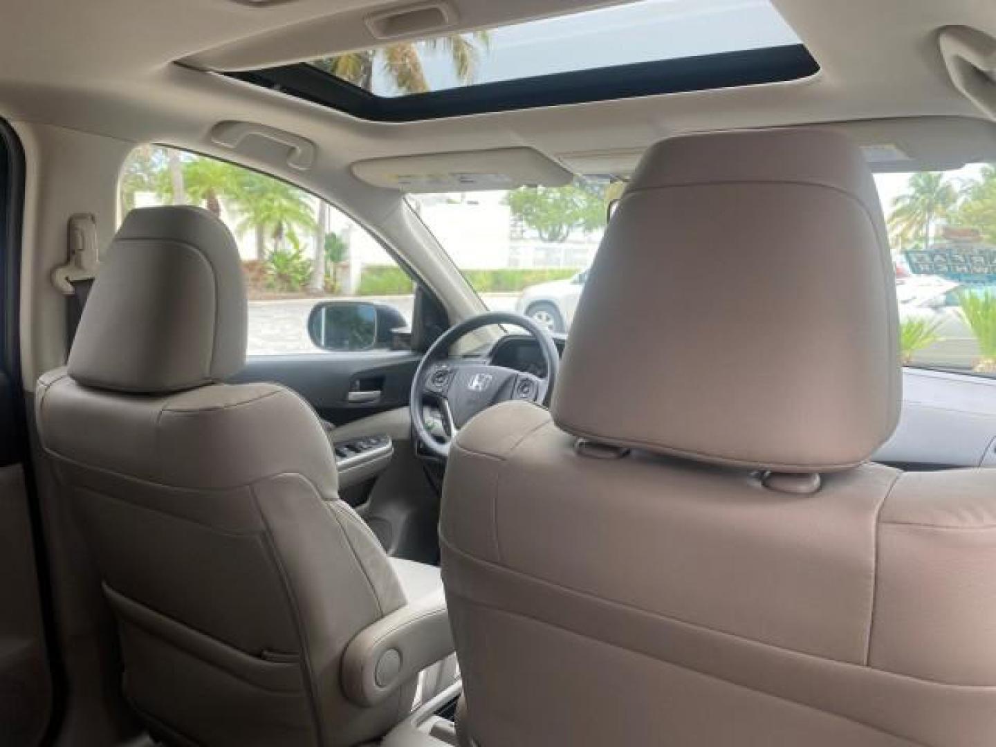 2014 Twilight Blue Metallic /Gray Honda CR-V EX-L LOW MILES 27,328 1 OWNER (2HKRM3H72EH) with an 2.4L I-4 16-Valve DOHC i-VTEC Engine engine, Automatic transmission, located at 4701 North Dixie Hwy, Pompano Beach, FL, 33064, (954) 422-2889, 26.240938, -80.123474 - OUR WEBPAGE FLORIDACARS1.COM HAS OVER 100 PHOTOS AND FREE CARFAX LINK 2014 HONDA CR-V EX-L VIN: 2HKRM3H72EH534254 2 H K R M 3 H 7 2 E H 5 3 4 2 5 4 4 DOOR WAGON/SPORT UTILITY 2.4L I4 F DOHC 16V GASOLINE FRONT WHEEL DRIVE Top Features Alloy Wheels Bluetooth Technology Front Seat Heaters Leather Seats - Photo#98