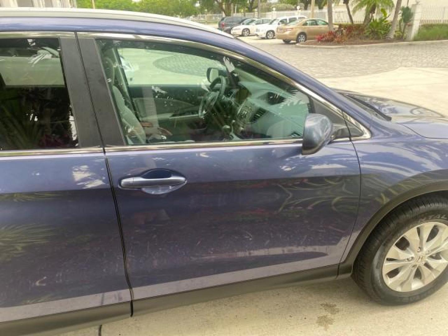 2014 Twilight Blue Metallic /Gray Honda CR-V EX-L LOW MILES 27,328 1 OWNER (2HKRM3H72EH) with an 2.4L I-4 16-Valve DOHC i-VTEC Engine engine, Automatic transmission, located at 4701 North Dixie Hwy, Pompano Beach, FL, 33064, (954) 422-2889, 26.240938, -80.123474 - OUR WEBPAGE FLORIDACARS1.COM HAS OVER 100 PHOTOS AND FREE CARFAX LINK 2014 HONDA CR-V EX-L VIN: 2HKRM3H72EH534254 2 H K R M 3 H 7 2 E H 5 3 4 2 5 4 4 DOOR WAGON/SPORT UTILITY 2.4L I4 F DOHC 16V GASOLINE FRONT WHEEL DRIVE Top Features Alloy Wheels Bluetooth Technology Front Seat Heaters Leather Seats - Photo#99