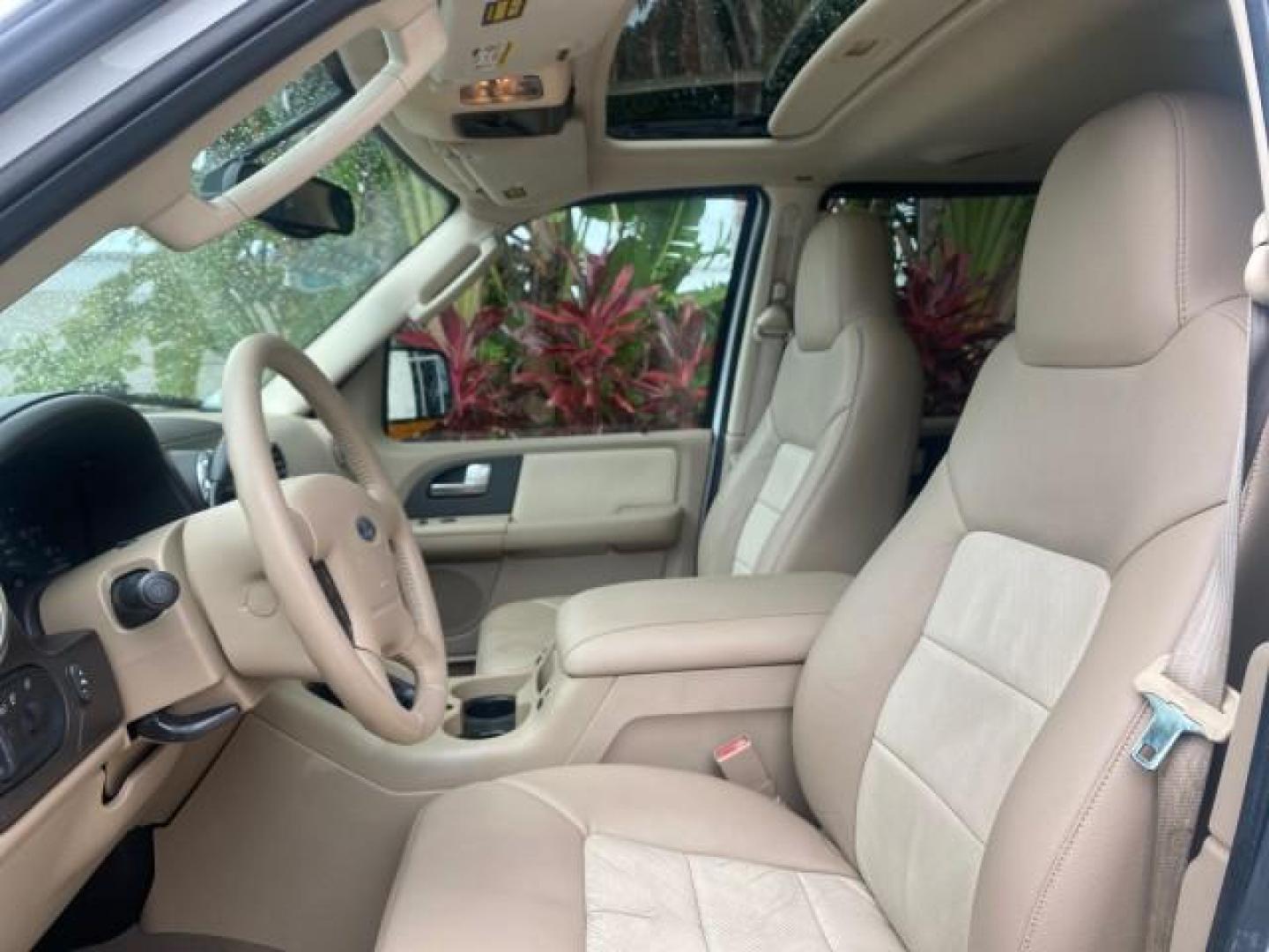 2003 Oxford White /Medium Parchment Ford Expedition Eddie Bauer 1 OWNER (1FMFU17L83L) with an 5.4L SOHC SEFI V8 Triton Engine engine, Automatic transmission, located at 4701 North Dixie Hwy, Pompano Beach, FL, 33064, (954) 422-2889, 26.240938, -80.123474 - OUR WEBPAGE FLORIDACARS1.COM HAS OVER 100 PHOTOS AND FREE CARFAX LINK 2003 FORD EXPEDITION EDDIE BAUER VIN: 1FMFU17L83LB96384 1 F M F U 1 7 L 8 3 L B 9 6 3 8 4 4 DOOR WAGON/SPORT UTILITY 5.4L V8 F SOHC 16V GASOLINE REAR WHEEL DRIVE Top Features Alloy Wheels Audiophile Sound System Front Seat Heaters - Photo#34