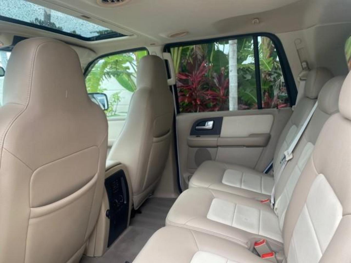 2003 Oxford White /Medium Parchment Ford Expedition Eddie Bauer 1 OWNER (1FMFU17L83L) with an 5.4L SOHC SEFI V8 Triton Engine engine, Automatic transmission, located at 4701 North Dixie Hwy, Pompano Beach, FL, 33064, (954) 422-2889, 26.240938, -80.123474 - OUR WEBPAGE FLORIDACARS1.COM HAS OVER 100 PHOTOS AND FREE CARFAX LINK 2003 FORD EXPEDITION EDDIE BAUER VIN: 1FMFU17L83LB96384 1 F M F U 1 7 L 8 3 L B 9 6 3 8 4 4 DOOR WAGON/SPORT UTILITY 5.4L V8 F SOHC 16V GASOLINE REAR WHEEL DRIVE Top Features Alloy Wheels Audiophile Sound System Front Seat Heaters - Photo#72