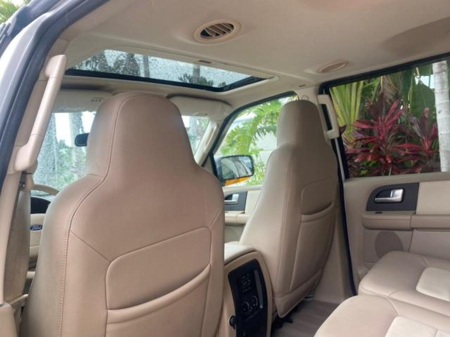 2003 Oxford White /Medium Parchment Ford Expedition Eddie Bauer 1 OWNER (1FMFU17L83L) with an 5.4L SOHC SEFI V8 Triton Engine engine, Automatic transmission, located at 4701 North Dixie Hwy, Pompano Beach, FL, 33064, (954) 422-2889, 26.240938, -80.123474 - OUR WEBPAGE FLORIDACARS1.COM HAS OVER 100 PHOTOS AND FREE CARFAX LINK 2003 FORD EXPEDITION EDDIE BAUER VIN: 1FMFU17L83LB96384 1 F M F U 1 7 L 8 3 L B 9 6 3 8 4 4 DOOR WAGON/SPORT UTILITY 5.4L V8 F SOHC 16V GASOLINE REAR WHEEL DRIVE Top Features Alloy Wheels Audiophile Sound System Front Seat Heaters - Photo#74