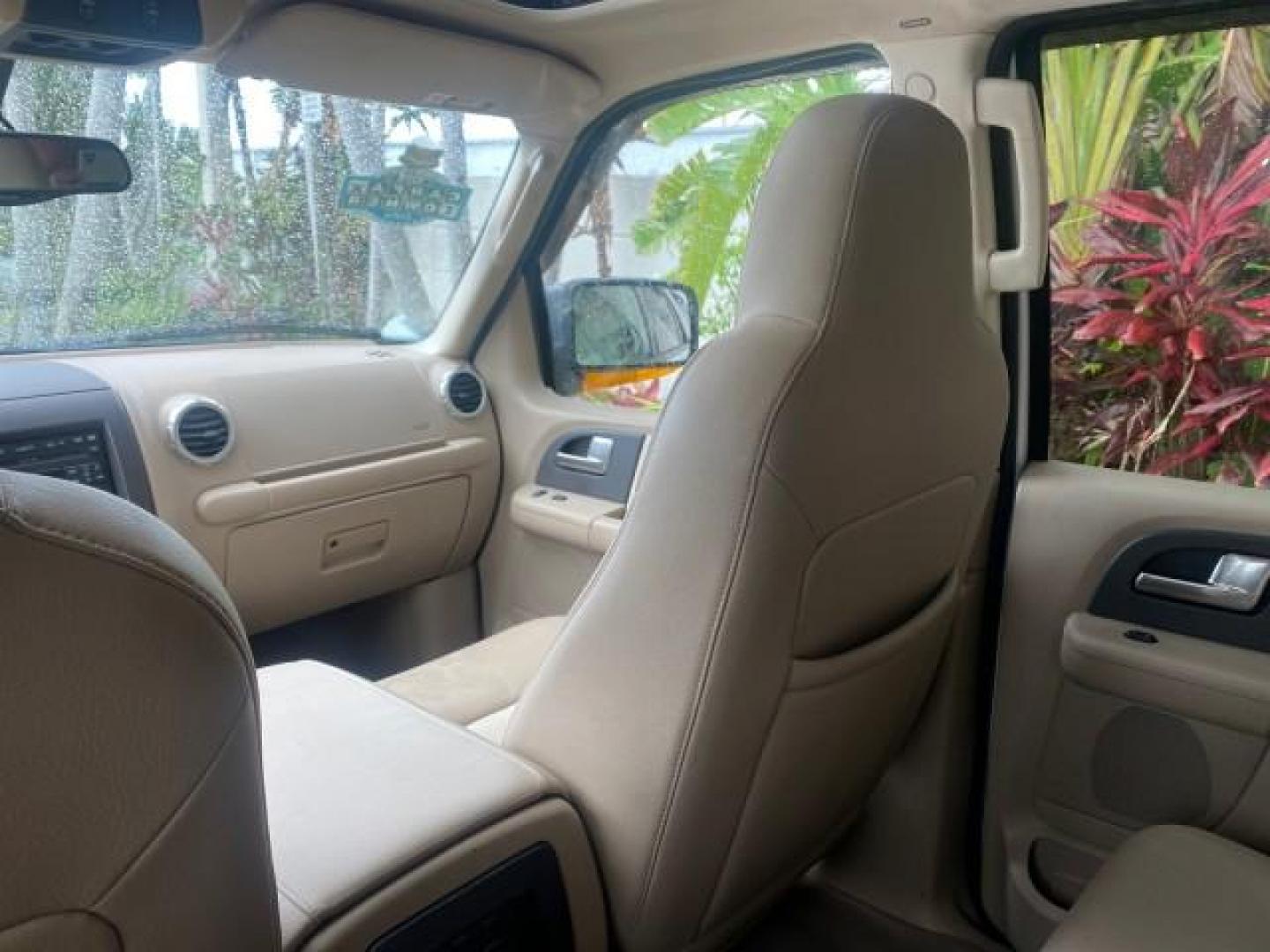 2003 Oxford White /Medium Parchment Ford Expedition Eddie Bauer 1 OWNER (1FMFU17L83L) with an 5.4L SOHC SEFI V8 Triton Engine engine, Automatic transmission, located at 4701 North Dixie Hwy, Pompano Beach, FL, 33064, (954) 422-2889, 26.240938, -80.123474 - OUR WEBPAGE FLORIDACARS1.COM HAS OVER 100 PHOTOS AND FREE CARFAX LINK 2003 FORD EXPEDITION EDDIE BAUER VIN: 1FMFU17L83LB96384 1 F M F U 1 7 L 8 3 L B 9 6 3 8 4 4 DOOR WAGON/SPORT UTILITY 5.4L V8 F SOHC 16V GASOLINE REAR WHEEL DRIVE Top Features Alloy Wheels Audiophile Sound System Front Seat Heaters - Photo#79