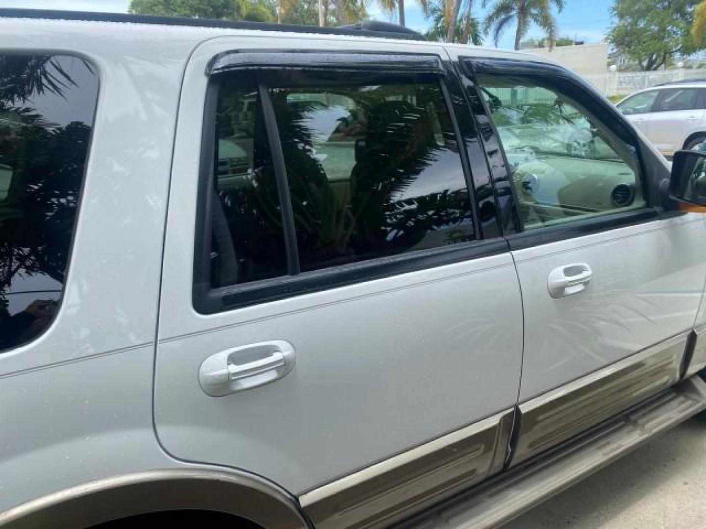 2003 Oxford White /Medium Parchment Ford Expedition Eddie Bauer 1 OWNER (1FMFU17L83L) with an 5.4L SOHC SEFI V8 Triton Engine engine, Automatic transmission, located at 4701 North Dixie Hwy, Pompano Beach, FL, 33064, (954) 422-2889, 26.240938, -80.123474 - OUR WEBPAGE FLORIDACARS1.COM HAS OVER 100 PHOTOS AND FREE CARFAX LINK 2003 FORD EXPEDITION EDDIE BAUER VIN: 1FMFU17L83LB96384 1 F M F U 1 7 L 8 3 L B 9 6 3 8 4 4 DOOR WAGON/SPORT UTILITY 5.4L V8 F SOHC 16V GASOLINE REAR WHEEL DRIVE Top Features Alloy Wheels Audiophile Sound System Front Seat Heaters - Photo#96