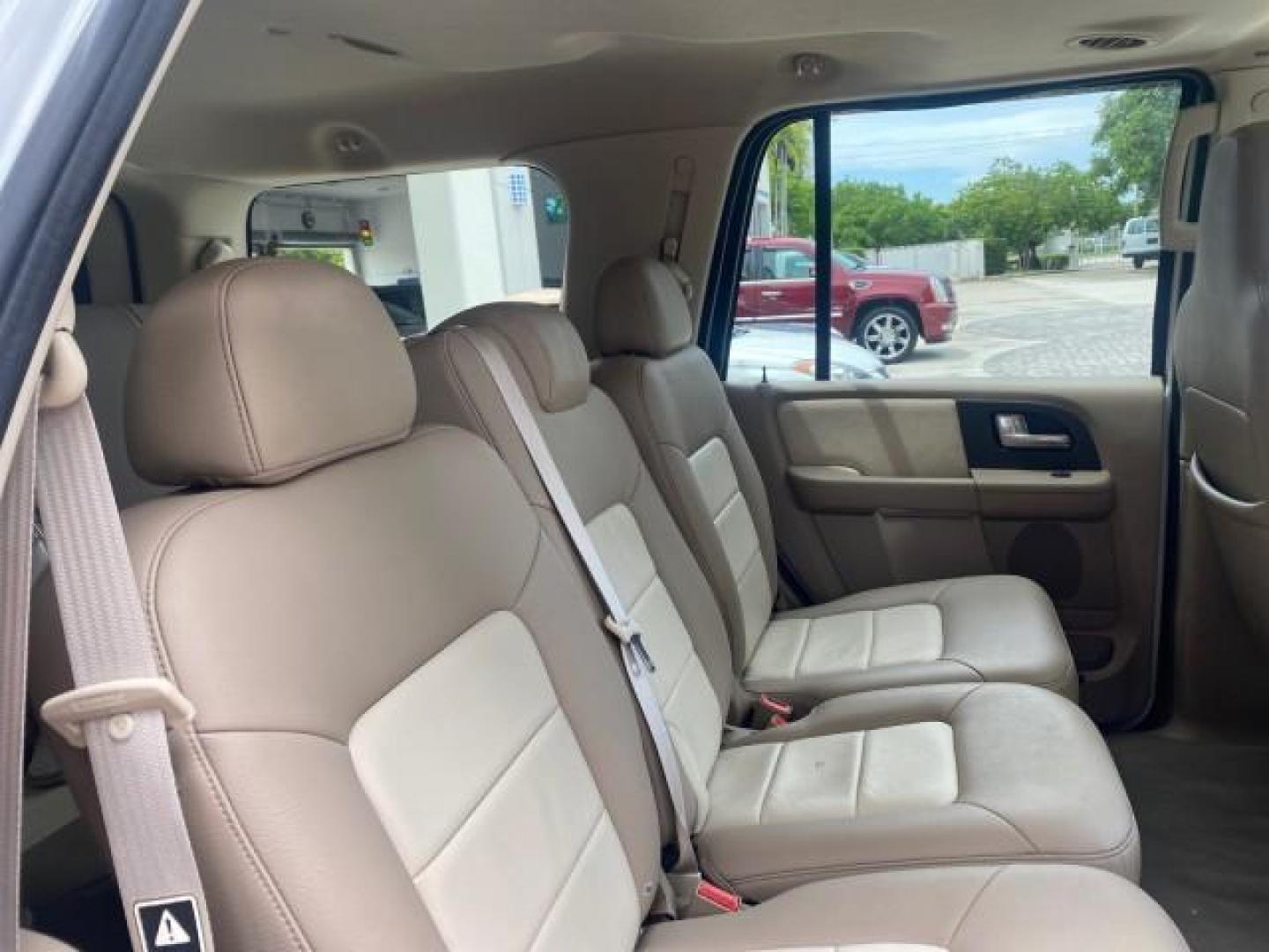 2003 Oxford White /Medium Parchment Ford Expedition Eddie Bauer 1 OWNER (1FMFU17L83L) with an 5.4L SOHC SEFI V8 Triton Engine engine, Automatic transmission, located at 4701 North Dixie Hwy, Pompano Beach, FL, 33064, (954) 422-2889, 26.240938, -80.123474 - OUR WEBPAGE FLORIDACARS1.COM HAS OVER 100 PHOTOS AND FREE CARFAX LINK 2003 FORD EXPEDITION EDDIE BAUER VIN: 1FMFU17L83LB96384 1 F M F U 1 7 L 8 3 L B 9 6 3 8 4 4 DOOR WAGON/SPORT UTILITY 5.4L V8 F SOHC 16V GASOLINE REAR WHEEL DRIVE Top Features Alloy Wheels Audiophile Sound System Front Seat Heaters - Photo#99