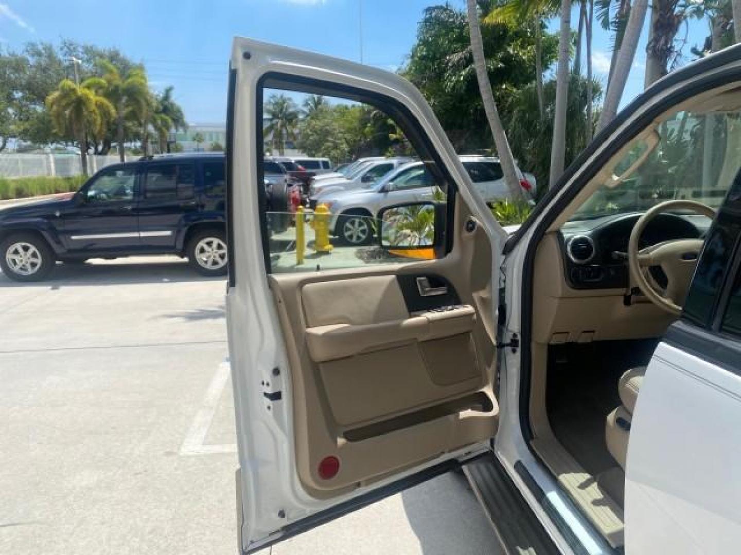 2003 Oxford White /Medium Parchment Ford Expedition Eddie Bauer 1 OWNER (1FMFU17L83L) with an 5.4L SOHC SEFI V8 Triton Engine engine, Automatic transmission, located at 4701 North Dixie Hwy, Pompano Beach, FL, 33064, (954) 422-2889, 26.240938, -80.123474 - OUR WEBPAGE FLORIDACARS1.COM HAS OVER 100 PHOTOS AND FREE CARFAX LINK 2003 FORD EXPEDITION EDDIE BAUER VIN: 1FMFU17L83LB96384 1 F M F U 1 7 L 8 3 L B 9 6 3 8 4 4 DOOR WAGON/SPORT UTILITY 5.4L V8 F SOHC 16V GASOLINE REAR WHEEL DRIVE Top Features Alloy Wheels Audiophile Sound System Front Seat Heaters - Photo#9