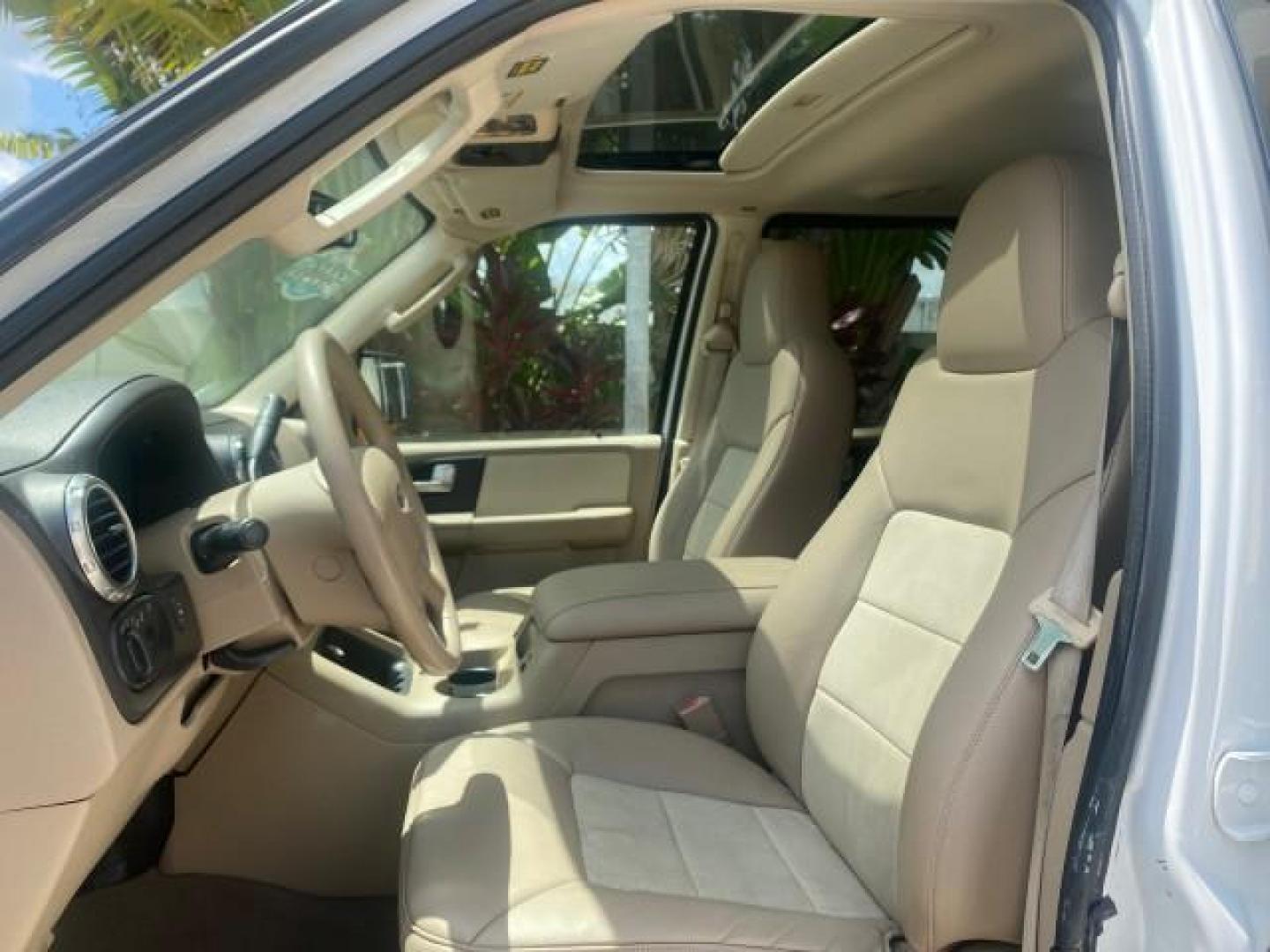 2003 Oxford White /Medium Parchment Ford Expedition Eddie Bauer 1 OWNER (1FMFU17L83L) with an 5.4L SOHC SEFI V8 Triton Engine engine, Automatic transmission, located at 4701 North Dixie Hwy, Pompano Beach, FL, 33064, (954) 422-2889, 26.240938, -80.123474 - OUR WEBPAGE FLORIDACARS1.COM HAS OVER 100 PHOTOS AND FREE CARFAX LINK 2003 FORD EXPEDITION EDDIE BAUER VIN: 1FMFU17L83LB96384 1 F M F U 1 7 L 8 3 L B 9 6 3 8 4 4 DOOR WAGON/SPORT UTILITY 5.4L V8 F SOHC 16V GASOLINE REAR WHEEL DRIVE Top Features Alloy Wheels Audiophile Sound System Front Seat Heaters - Photo#34