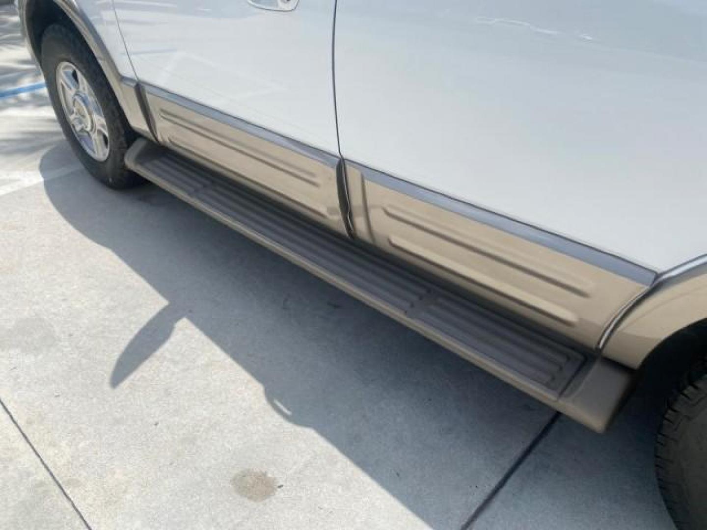 2003 Oxford White /Medium Parchment Ford Expedition Eddie Bauer 1 OWNER (1FMFU17L83L) with an 5.4L SOHC SEFI V8 Triton Engine engine, Automatic transmission, located at 4701 North Dixie Hwy, Pompano Beach, FL, 33064, (954) 422-2889, 26.240938, -80.123474 - OUR WEBPAGE FLORIDACARS1.COM HAS OVER 100 PHOTOS AND FREE CARFAX LINK 2003 FORD EXPEDITION EDDIE BAUER VIN: 1FMFU17L83LB96384 1 F M F U 1 7 L 8 3 L B 9 6 3 8 4 4 DOOR WAGON/SPORT UTILITY 5.4L V8 F SOHC 16V GASOLINE REAR WHEEL DRIVE Top Features Alloy Wheels Audiophile Sound System Front Seat Heaters - Photo#71