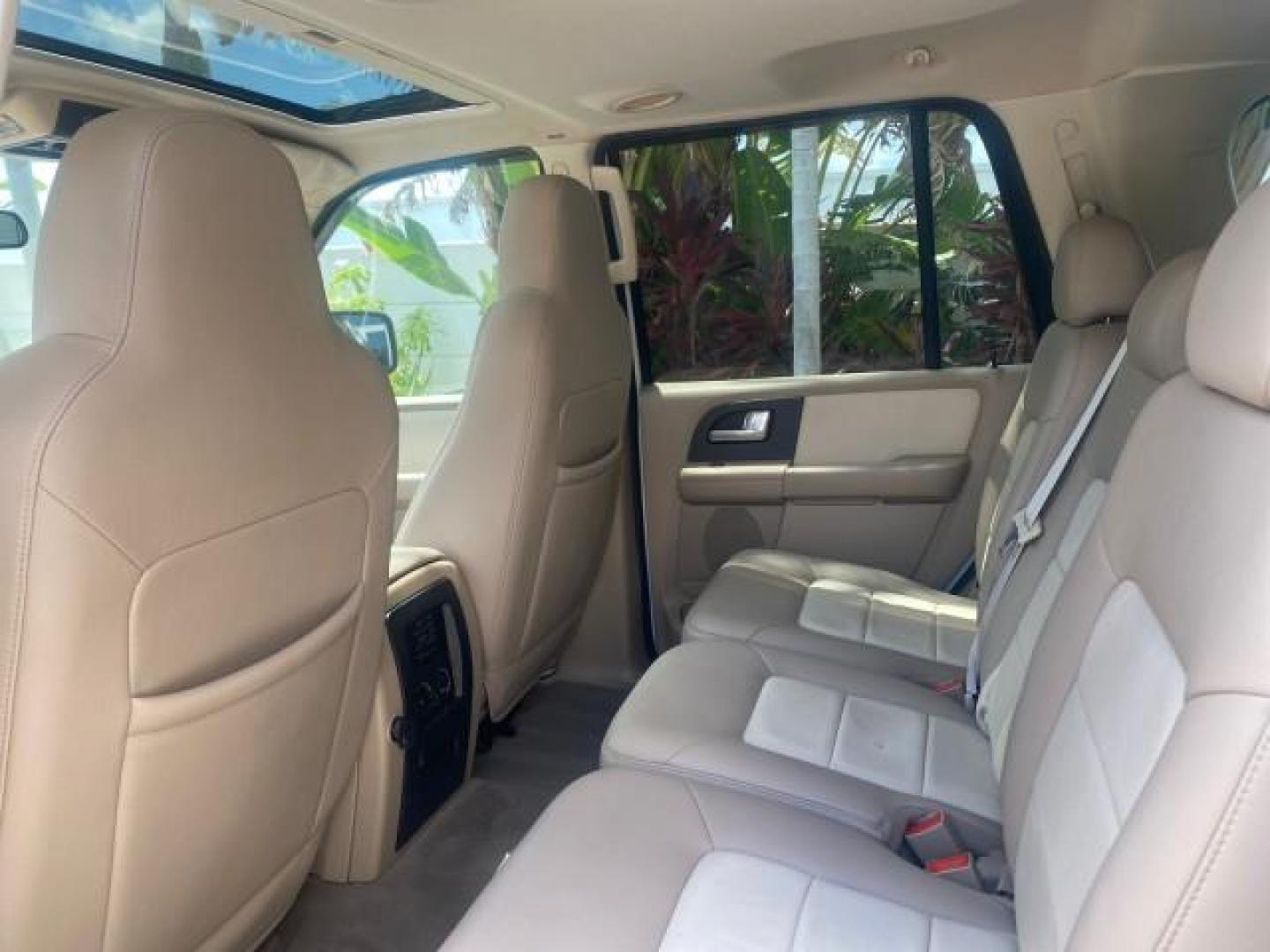 2003 Oxford White /Medium Parchment Ford Expedition Eddie Bauer 1 OWNER (1FMFU17L83L) with an 5.4L SOHC SEFI V8 Triton Engine engine, Automatic transmission, located at 4701 North Dixie Hwy, Pompano Beach, FL, 33064, (954) 422-2889, 26.240938, -80.123474 - OUR WEBPAGE FLORIDACARS1.COM HAS OVER 100 PHOTOS AND FREE CARFAX LINK 2003 FORD EXPEDITION EDDIE BAUER VIN: 1FMFU17L83LB96384 1 F M F U 1 7 L 8 3 L B 9 6 3 8 4 4 DOOR WAGON/SPORT UTILITY 5.4L V8 F SOHC 16V GASOLINE REAR WHEEL DRIVE Top Features Alloy Wheels Audiophile Sound System Front Seat Heaters - Photo#77