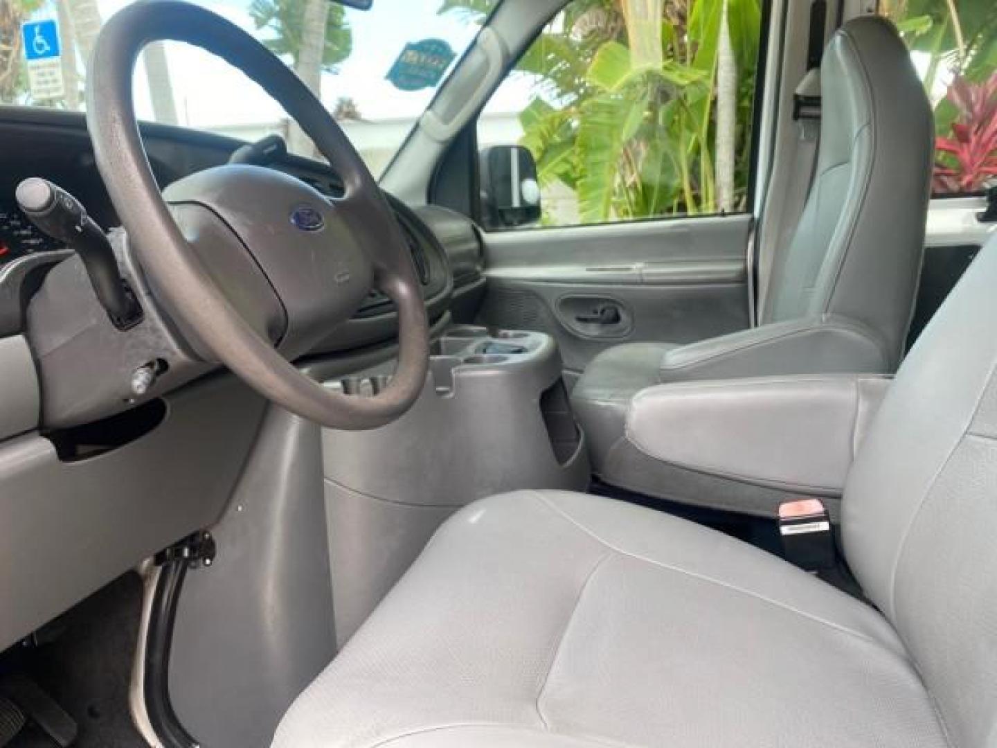 2005 Yellow Metallic /Medium Flint Ford Econoline Wagon 15 PASSENGER XL LOW MILES 49,408 (1FBSS31L05H) with an 5.4L EFI V8 Engine engine, Automatic transmission, located at 4701 North Dixie Hwy, Pompano Beach, FL, 33064, (954) 422-2889, 26.240938, -80.123474 - OUR WEBPAGE FLORIDACARS1.COM HAS OVER 100 PHOTOS AND FREE CARFAX LINK 2005 FORD E-SERIES E-350 SD XLT WE LOCATTED 2 REAR SEATS TO MAKE IT A 15 PASSEGER VIN: 1FBSS31L05HA95671 1 F B S S 3 1 L 0 5 H A 9 5 6 7 1 VAN 5.4L V8 F GASOLINE REAR WHEEL DRIVE Top Features Rear Air Conditioning Third Row Seat V - Photo#36