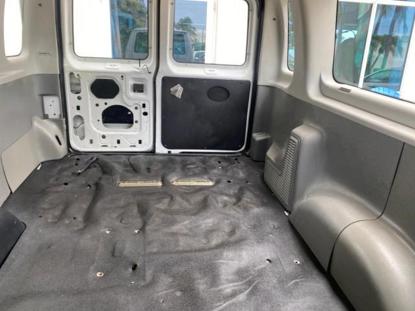 2005 Yellow Metallic /Medium Flint Ford Econoline Wagon 15 PASSENGER XL LOW MILES 49,408 (1FBSS31L05H) with an 5.4L EFI V8 Engine engine, Automatic transmission, located at 4701 North Dixie Hwy, Pompano Beach, FL, 33064, (954) 422-2889, 26.240938, -80.123474 - OUR WEBPAGE FLORIDACARS1.COM HAS OVER 100 PHOTOS AND FREE CARFAX LINK 2005 FORD E-SERIES E-350 SD XLT WE LOCATTED 2 REAR SEATS TO MAKE IT A 15 PASSEGER VIN: 1FBSS31L05HA95671 1 F B S S 3 1 L 0 5 H A 9 5 6 7 1 VAN 5.4L V8 F GASOLINE REAR WHEEL DRIVE Top Features Rear Air Conditioning Third Row Seat V - Photo#62