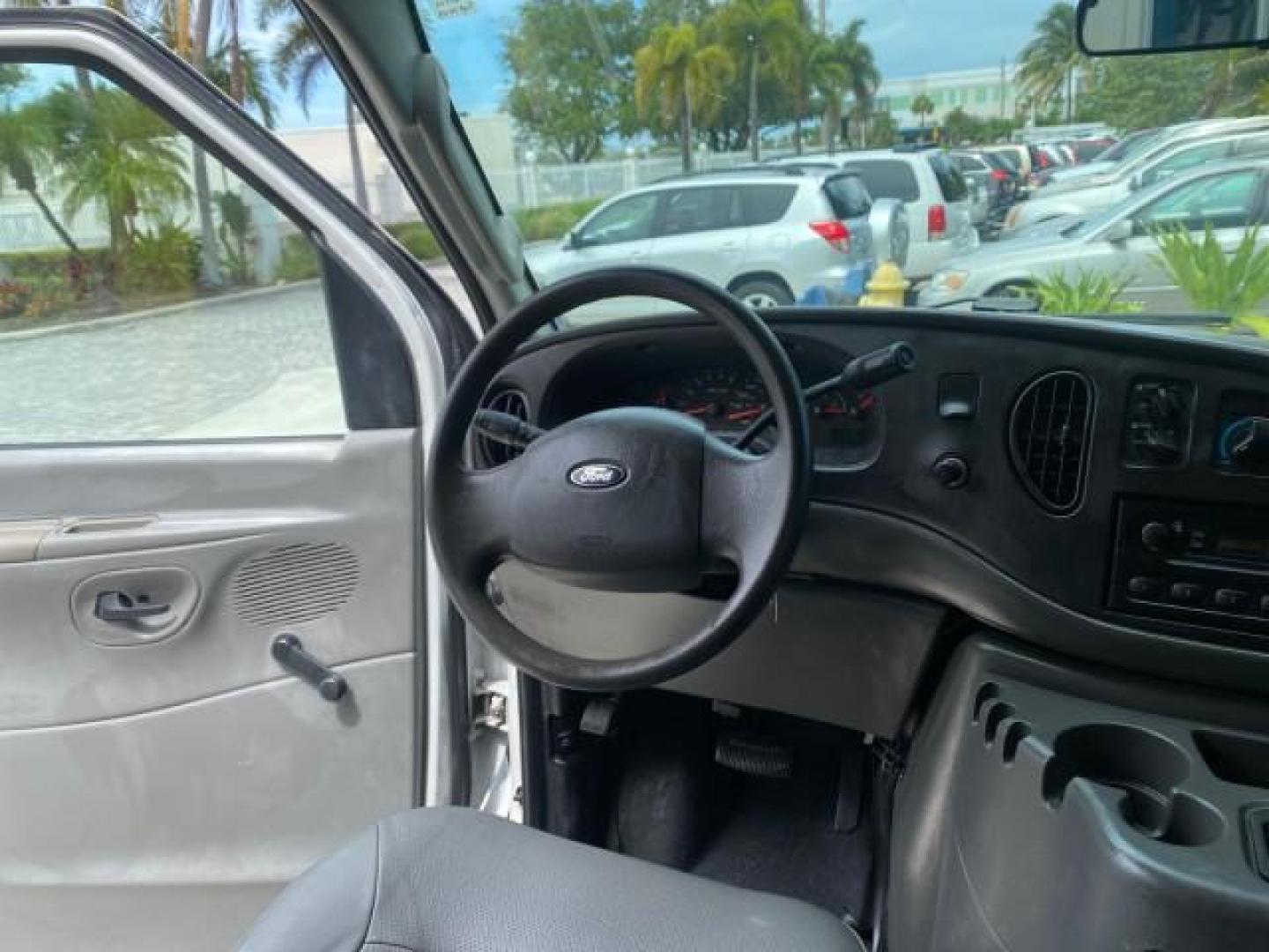 2005 Yellow Metallic /Medium Flint Ford Econoline Wagon 15 PASSENGER XL LOW MILES 49,408 (1FBSS31L05H) with an 5.4L EFI V8 Engine engine, Automatic transmission, located at 4701 North Dixie Hwy, Pompano Beach, FL, 33064, (954) 422-2889, 26.240938, -80.123474 - OUR WEBPAGE FLORIDACARS1.COM HAS OVER 100 PHOTOS AND FREE CARFAX LINK 2005 FORD E-SERIES E-350 SD XLT WE LOCATTED 2 REAR SEATS TO MAKE IT A 15 PASSEGER VIN: 1FBSS31L05HA95671 1 F B S S 3 1 L 0 5 H A 9 5 6 7 1 VAN 5.4L V8 F GASOLINE REAR WHEEL DRIVE Top Features Rear Air Conditioning Third Row Seat V - Photo#69
