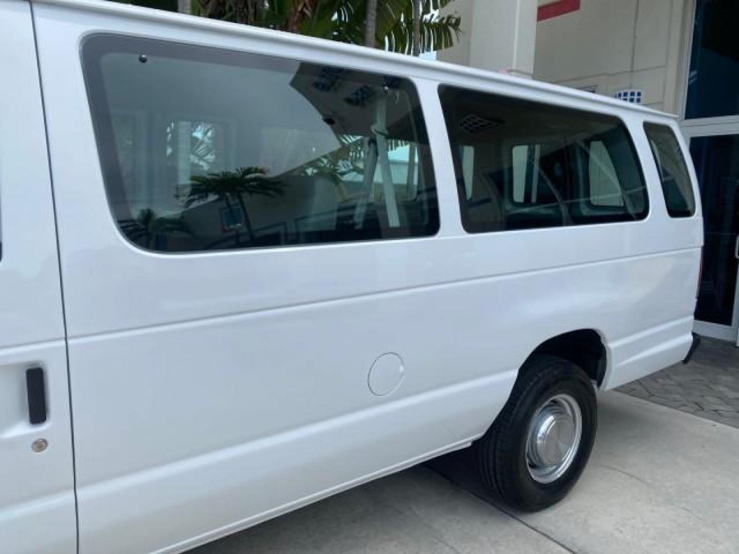 2005 Yellow Metallic /Medium Flint Ford Econoline Wagon 15 PASSENGER XL LOW MILES 49,408 (1FBSS31L05H) with an 5.4L EFI V8 Engine engine, Automatic transmission, located at 4701 North Dixie Hwy, Pompano Beach, FL, 33064, (954) 422-2889, 26.240938, -80.123474 - OUR WEBPAGE FLORIDACARS1.COM HAS OVER 100 PHOTOS AND FREE CARFAX LINK 2005 FORD E-SERIES E-350 SD XLT WE LOCATTED 2 REAR SEATS TO MAKE IT A 15 PASSEGER VIN: 1FBSS31L05HA95671 1 F B S S 3 1 L 0 5 H A 9 5 6 7 1 VAN 5.4L V8 F GASOLINE REAR WHEEL DRIVE Top Features Rear Air Conditioning Third Row Seat V - Photo#70