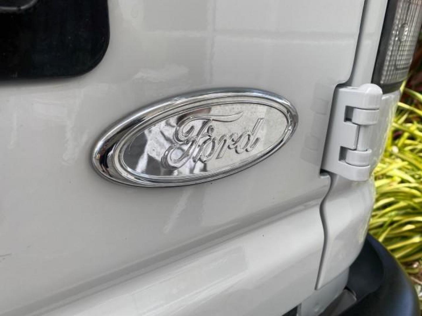 2005 Yellow Metallic /Medium Flint Ford Econoline Wagon 15 PASSENGER XL LOW MILES 49,408 (1FBSS31L05H) with an 5.4L EFI V8 Engine engine, Automatic transmission, located at 4701 North Dixie Hwy, Pompano Beach, FL, 33064, (954) 422-2889, 26.240938, -80.123474 - OUR WEBPAGE FLORIDACARS1.COM HAS OVER 100 PHOTOS AND FREE CARFAX LINK 2005 FORD E-SERIES E-350 SD XLT WE LOCATTED 2 REAR SEATS TO MAKE IT A 15 PASSEGER VIN: 1FBSS31L05HA95671 1 F B S S 3 1 L 0 5 H A 9 5 6 7 1 VAN 5.4L V8 F GASOLINE REAR WHEEL DRIVE Top Features Rear Air Conditioning Third Row Seat V - Photo#80