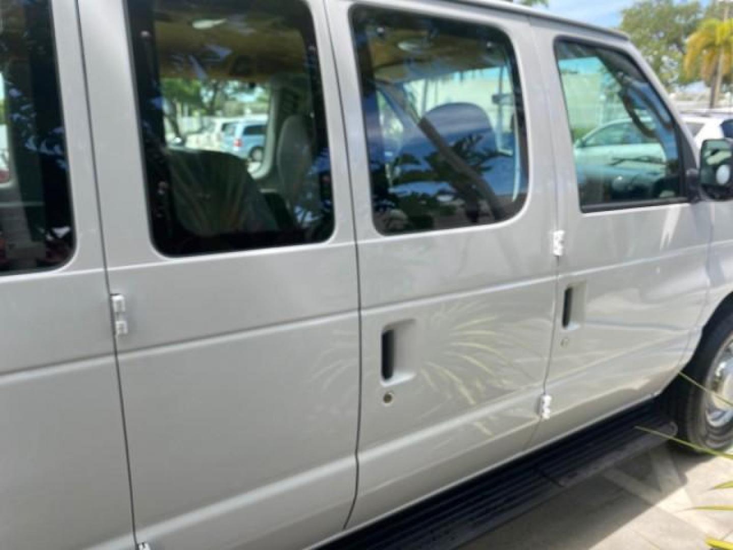 2005 Yellow Metallic /Medium Flint Ford Econoline Wagon 15 PASSENGER XL LOW MILES 49,408 (1FBSS31L05H) with an 5.4L EFI V8 Engine engine, Automatic transmission, located at 4701 North Dixie Hwy, Pompano Beach, FL, 33064, (954) 422-2889, 26.240938, -80.123474 - OUR WEBPAGE FLORIDACARS1.COM HAS OVER 100 PHOTOS AND FREE CARFAX LINK 2005 FORD E-SERIES E-350 SD XLT WE LOCATTED 2 REAR SEATS TO MAKE IT A 15 PASSEGER VIN: 1FBSS31L05HA95671 1 F B S S 3 1 L 0 5 H A 9 5 6 7 1 VAN 5.4L V8 F GASOLINE REAR WHEEL DRIVE Top Features Rear Air Conditioning Third Row Seat V - Photo#88
