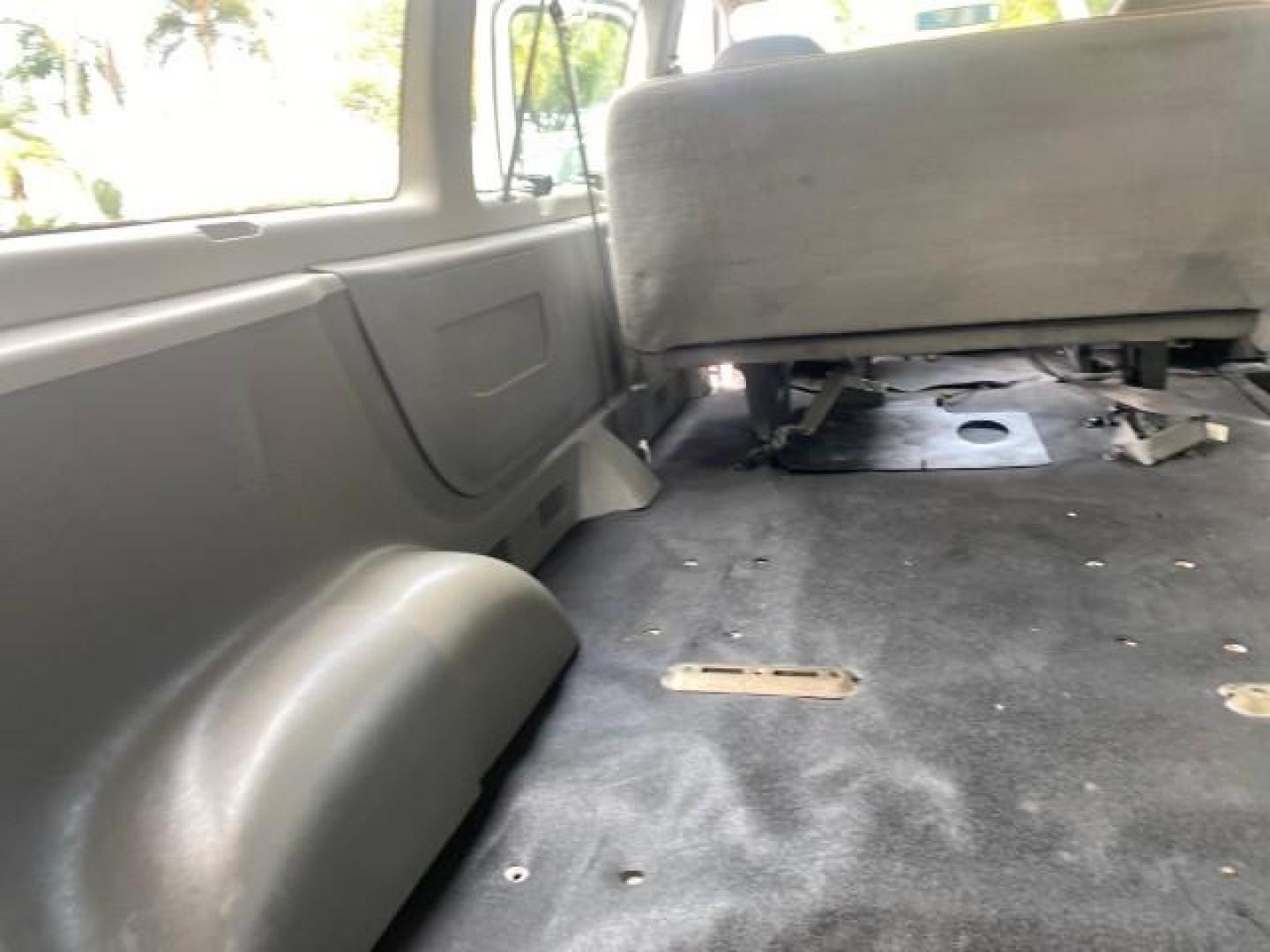 2005 Yellow Metallic /Medium Flint Ford Econoline Wagon 15 PASSENGER XL LOW MILES 49,408 (1FBSS31L05H) with an 5.4L EFI V8 Engine engine, Automatic transmission, located at 4701 North Dixie Hwy, Pompano Beach, FL, 33064, (954) 422-2889, 26.240938, -80.123474 - OUR WEBPAGE FLORIDACARS1.COM HAS OVER 100 PHOTOS AND FREE CARFAX LINK 2005 FORD E-SERIES E-350 SD XLT WE LOCATTED 2 REAR SEATS TO MAKE IT A 15 PASSEGER VIN: 1FBSS31L05HA95671 1 F B S S 3 1 L 0 5 H A 9 5 6 7 1 VAN 5.4L V8 F GASOLINE REAR WHEEL DRIVE Top Features Rear Air Conditioning Third Row Seat V - Photo#92