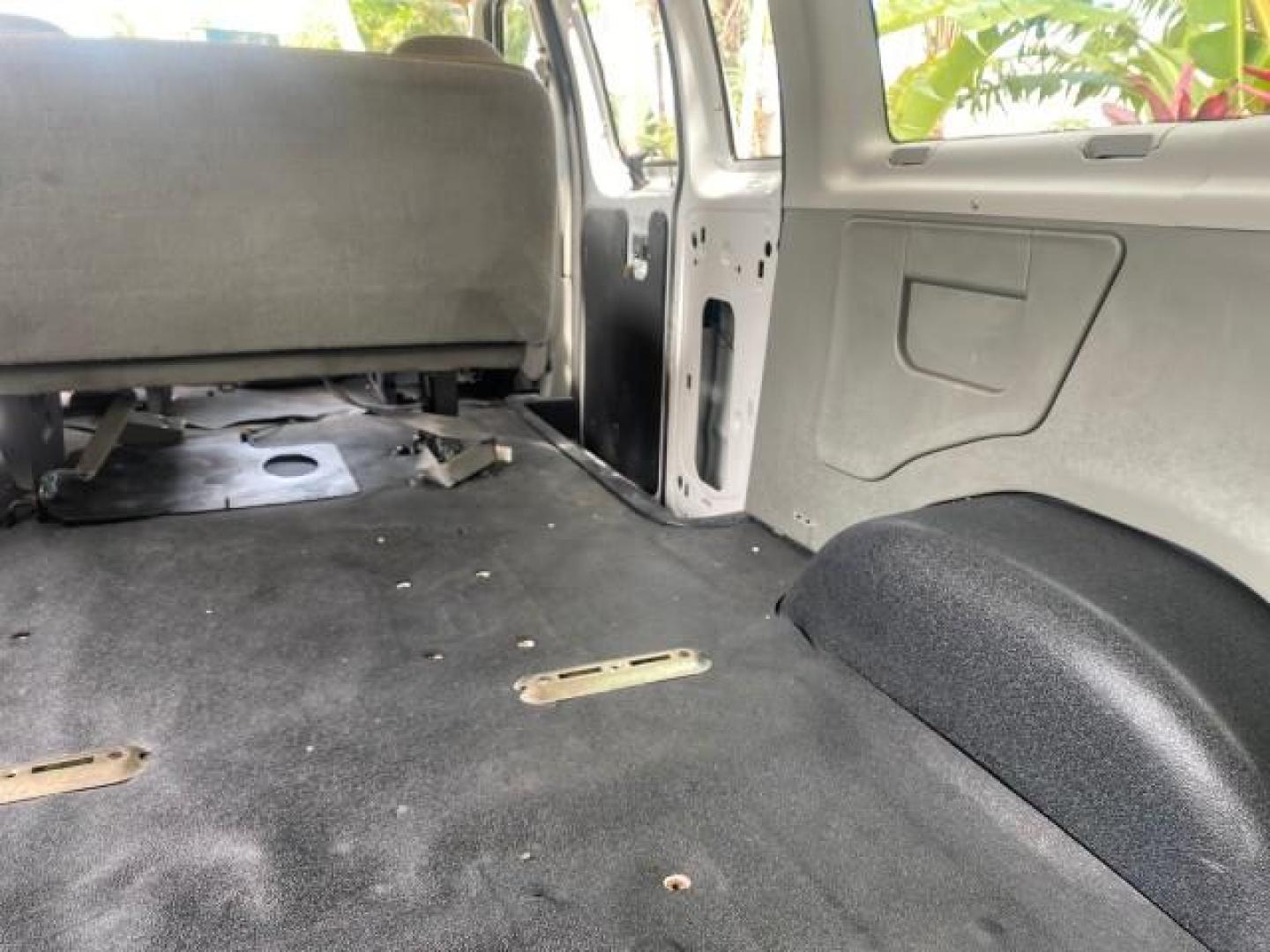 2005 Yellow Metallic /Medium Flint Ford Econoline Wagon 15 PASSENGER XL LOW MILES 49,408 (1FBSS31L05H) with an 5.4L EFI V8 Engine engine, Automatic transmission, located at 4701 North Dixie Hwy, Pompano Beach, FL, 33064, (954) 422-2889, 26.240938, -80.123474 - OUR WEBPAGE FLORIDACARS1.COM HAS OVER 100 PHOTOS AND FREE CARFAX LINK 2005 FORD E-SERIES E-350 SD XLT WE LOCATTED 2 REAR SEATS TO MAKE IT A 15 PASSEGER VIN: 1FBSS31L05HA95671 1 F B S S 3 1 L 0 5 H A 9 5 6 7 1 VAN 5.4L V8 F GASOLINE REAR WHEEL DRIVE Top Features Rear Air Conditioning Third Row Seat V - Photo#93