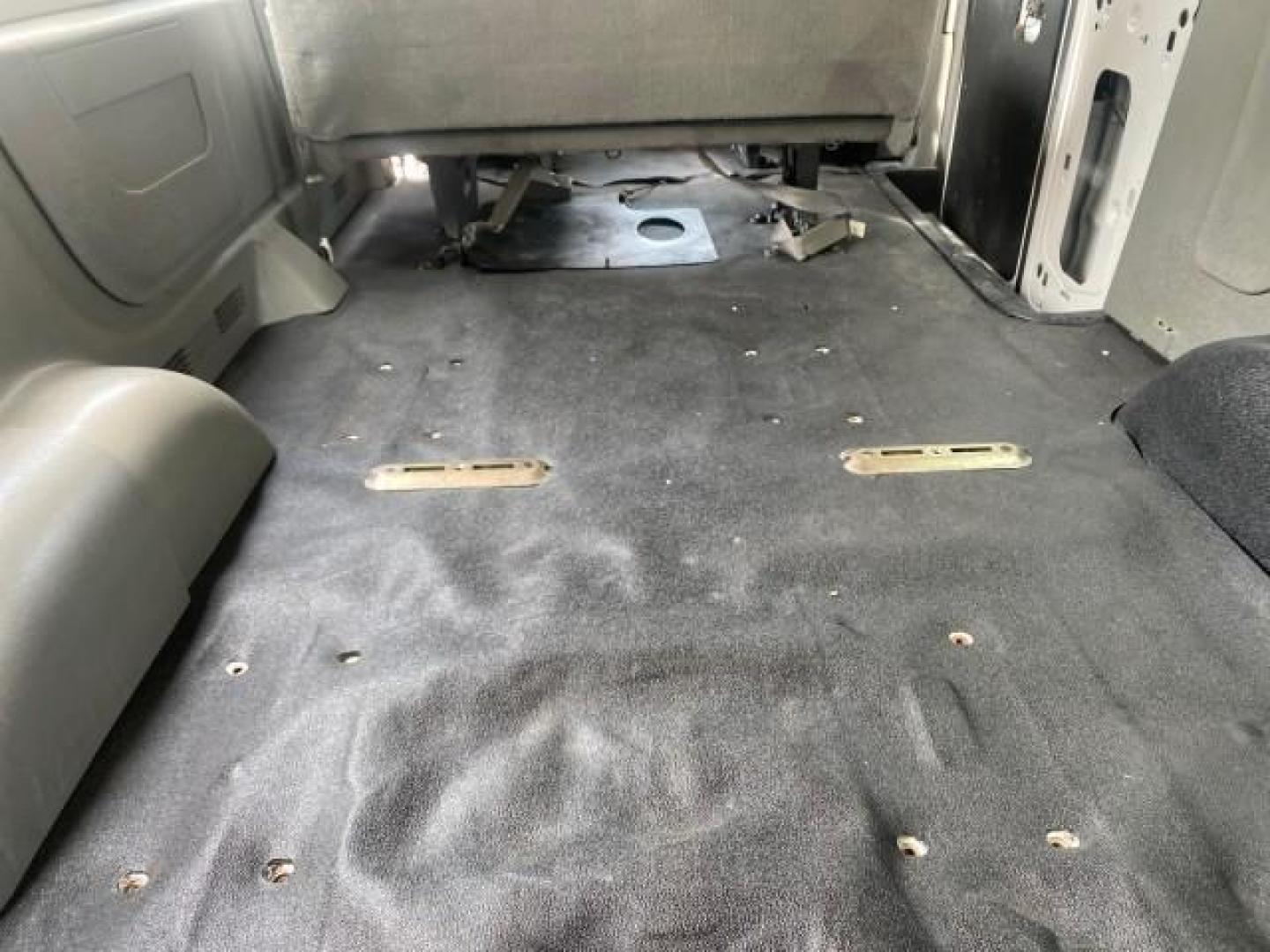 2005 Yellow Metallic /Medium Flint Ford Econoline Wagon 15 PASSENGER XL LOW MILES 49,408 (1FBSS31L05H) with an 5.4L EFI V8 Engine engine, Automatic transmission, located at 4701 North Dixie Hwy, Pompano Beach, FL, 33064, (954) 422-2889, 26.240938, -80.123474 - OUR WEBPAGE FLORIDACARS1.COM HAS OVER 100 PHOTOS AND FREE CARFAX LINK 2005 FORD E-SERIES E-350 SD XLT WE LOCATTED 2 REAR SEATS TO MAKE IT A 15 PASSEGER VIN: 1FBSS31L05HA95671 1 F B S S 3 1 L 0 5 H A 9 5 6 7 1 VAN 5.4L V8 F GASOLINE REAR WHEEL DRIVE Top Features Rear Air Conditioning Third Row Seat V - Photo#94