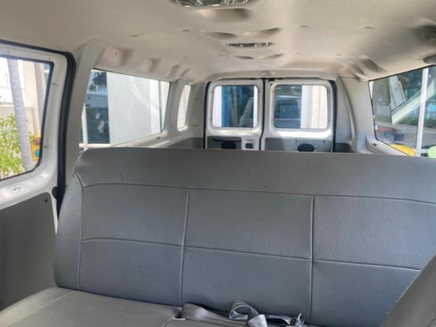 2005 Oxford White /Medium Flint Ford Econoline Wagon 5 PASSENGER XL LOW MILES 49,408 (1FBSS31L05H) with an 5.4L EFI V8 Engine engine, Automatic transmission, located at 4701 North Dixie Hwy, Pompano Beach, FL, 33064, (954) 422-2889, 26.240938, -80.123474 - OUR WEBPAGE FLORIDACARS1.COM HAS OVER 100 PHOTOS AND FREE CARFAX LINK 2005 FORD E-SERIES E-350 SD XLT 5PASSENGER VIN: 1FBSS31L05HA95671 1 F B S S 3 1 L 0 5 H A 9 5 6 7 1 VAN 5.4L V8 F GASOLINE REAR WHEEL DRIVE Top Features Rear Air Conditioning Third Row Seat Vinyl Seats Basic Features ABS Brakes AM - Photo#14
