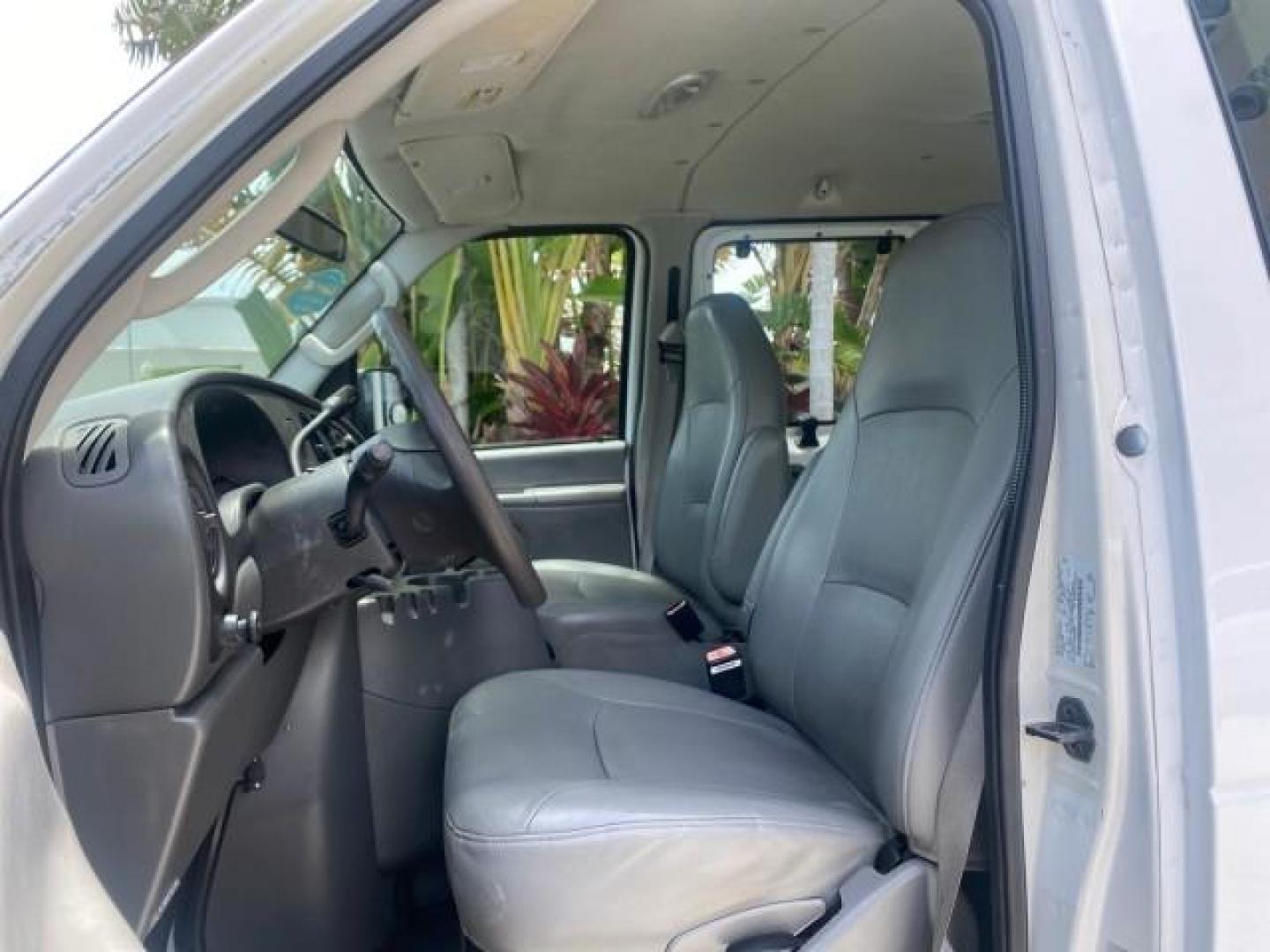 2005 Oxford White /Medium Flint Ford Econoline Wagon 5 PASSENGER XL LOW MILES 49,408 (1FBSS31L05H) with an 5.4L EFI V8 Engine engine, Automatic transmission, located at 4701 North Dixie Hwy, Pompano Beach, FL, 33064, (954) 422-2889, 26.240938, -80.123474 - OUR WEBPAGE FLORIDACARS1.COM HAS OVER 100 PHOTOS AND FREE CARFAX LINK 2005 FORD E-SERIES E-350 SD XLT 5PASSENGER VIN: 1FBSS31L05HA95671 1 F B S S 3 1 L 0 5 H A 9 5 6 7 1 VAN 5.4L V8 F GASOLINE REAR WHEEL DRIVE Top Features Rear Air Conditioning Third Row Seat Vinyl Seats Basic Features ABS Brakes AM - Photo#34