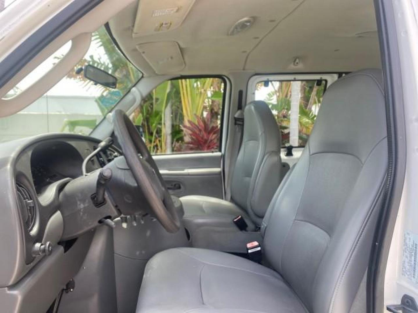 2005 Oxford White /Medium Flint Ford Econoline Wagon 5 PASSENGER XL LOW MILES 49,408 (1FBSS31L05H) with an 5.4L EFI V8 Engine engine, Automatic transmission, located at 4701 North Dixie Hwy, Pompano Beach, FL, 33064, (954) 422-2889, 26.240938, -80.123474 - OUR WEBPAGE FLORIDACARS1.COM HAS OVER 100 PHOTOS AND FREE CARFAX LINK 2005 FORD E-SERIES E-350 SD XLT 5PASSENGER VIN: 1FBSS31L05HA95671 1 F B S S 3 1 L 0 5 H A 9 5 6 7 1 VAN 5.4L V8 F GASOLINE REAR WHEEL DRIVE Top Features Rear Air Conditioning Third Row Seat Vinyl Seats Basic Features ABS Brakes AM - Photo#35