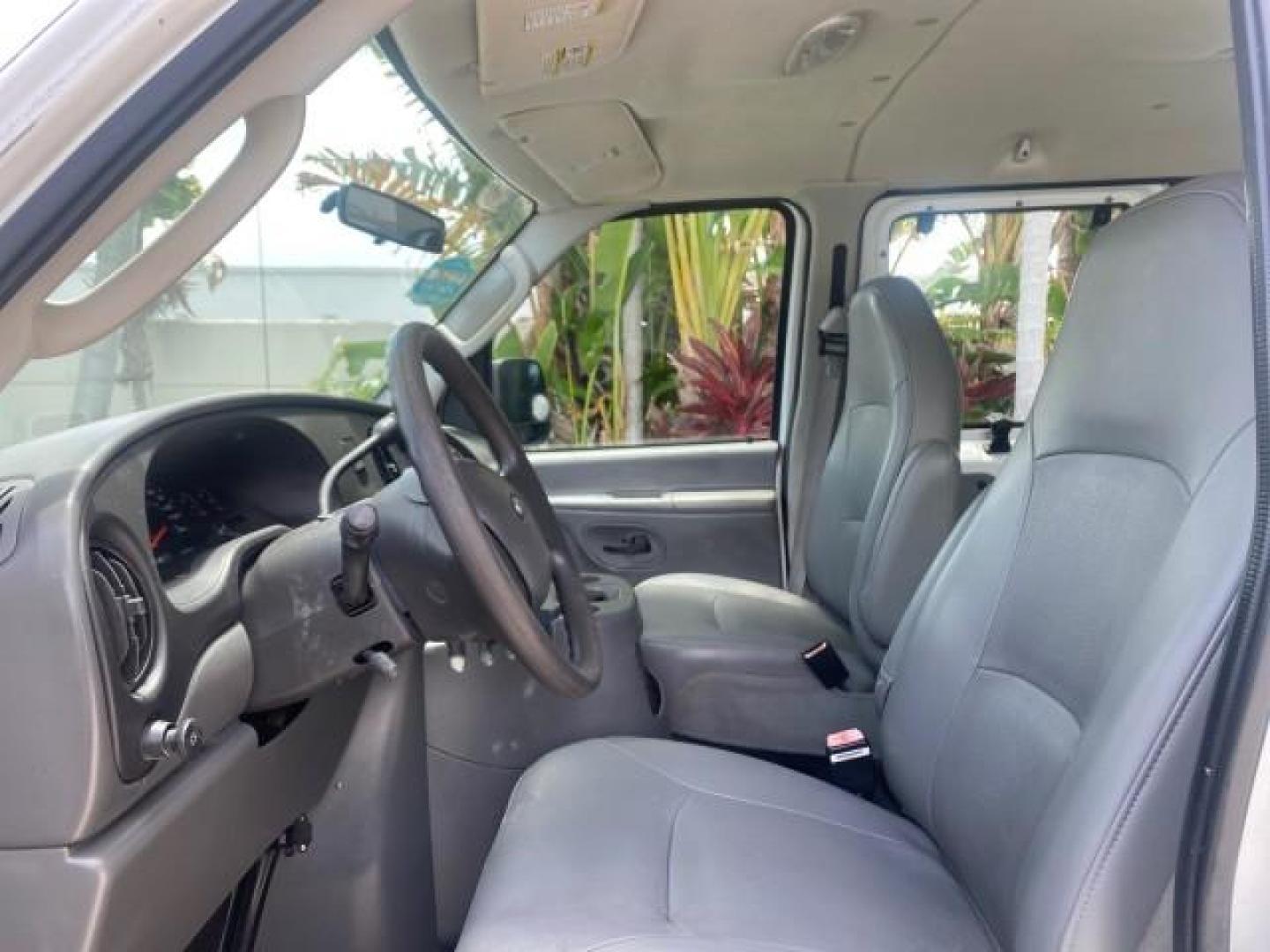 2005 Oxford White /Medium Flint Ford Econoline Wagon 5 PASSENGER XL LOW MILES 49,408 (1FBSS31L05H) with an 5.4L EFI V8 Engine engine, Automatic transmission, located at 4701 North Dixie Hwy, Pompano Beach, FL, 33064, (954) 422-2889, 26.240938, -80.123474 - OUR WEBPAGE FLORIDACARS1.COM HAS OVER 100 PHOTOS AND FREE CARFAX LINK 2005 FORD E-SERIES E-350 SD XLT 5PASSENGER VIN: 1FBSS31L05HA95671 1 F B S S 3 1 L 0 5 H A 9 5 6 7 1 VAN 5.4L V8 F GASOLINE REAR WHEEL DRIVE Top Features Rear Air Conditioning Third Row Seat Vinyl Seats Basic Features ABS Brakes AM - Photo#36