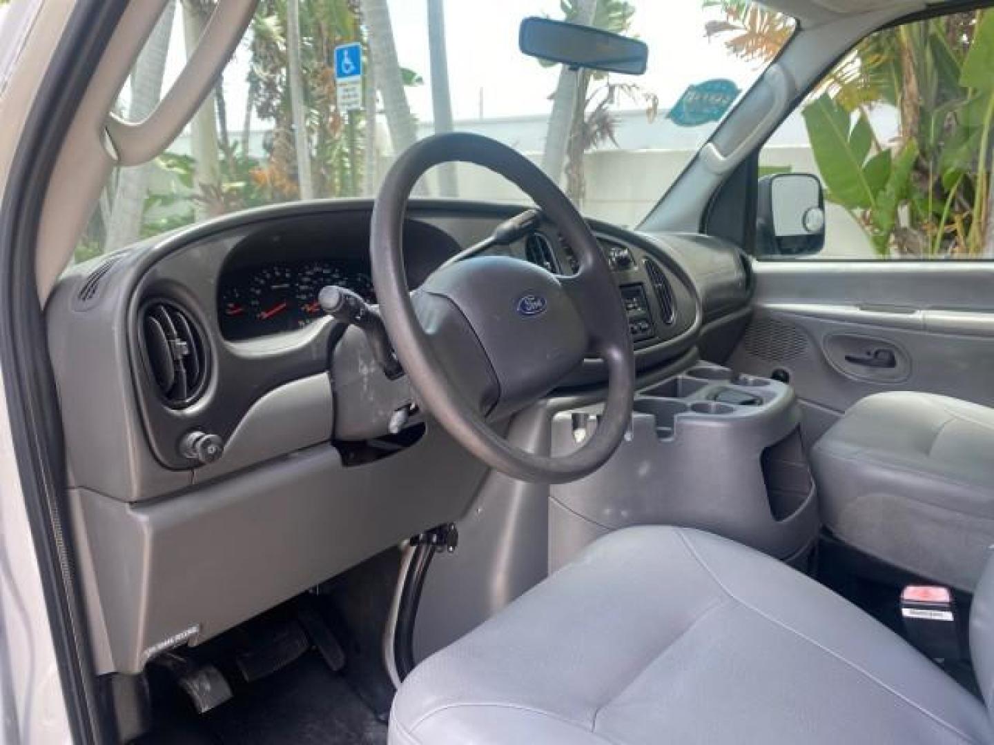 2005 Oxford White /Medium Flint Ford Econoline Wagon 5 PASSENGER XL LOW MILES 49,408 (1FBSS31L05H) with an 5.4L EFI V8 Engine engine, Automatic transmission, located at 4701 North Dixie Hwy, Pompano Beach, FL, 33064, (954) 422-2889, 26.240938, -80.123474 - OUR WEBPAGE FLORIDACARS1.COM HAS OVER 100 PHOTOS AND FREE CARFAX LINK 2005 FORD E-SERIES E-350 SD XLT 5PASSENGER VIN: 1FBSS31L05HA95671 1 F B S S 3 1 L 0 5 H A 9 5 6 7 1 VAN 5.4L V8 F GASOLINE REAR WHEEL DRIVE Top Features Rear Air Conditioning Third Row Seat Vinyl Seats Basic Features ABS Brakes AM - Photo#39