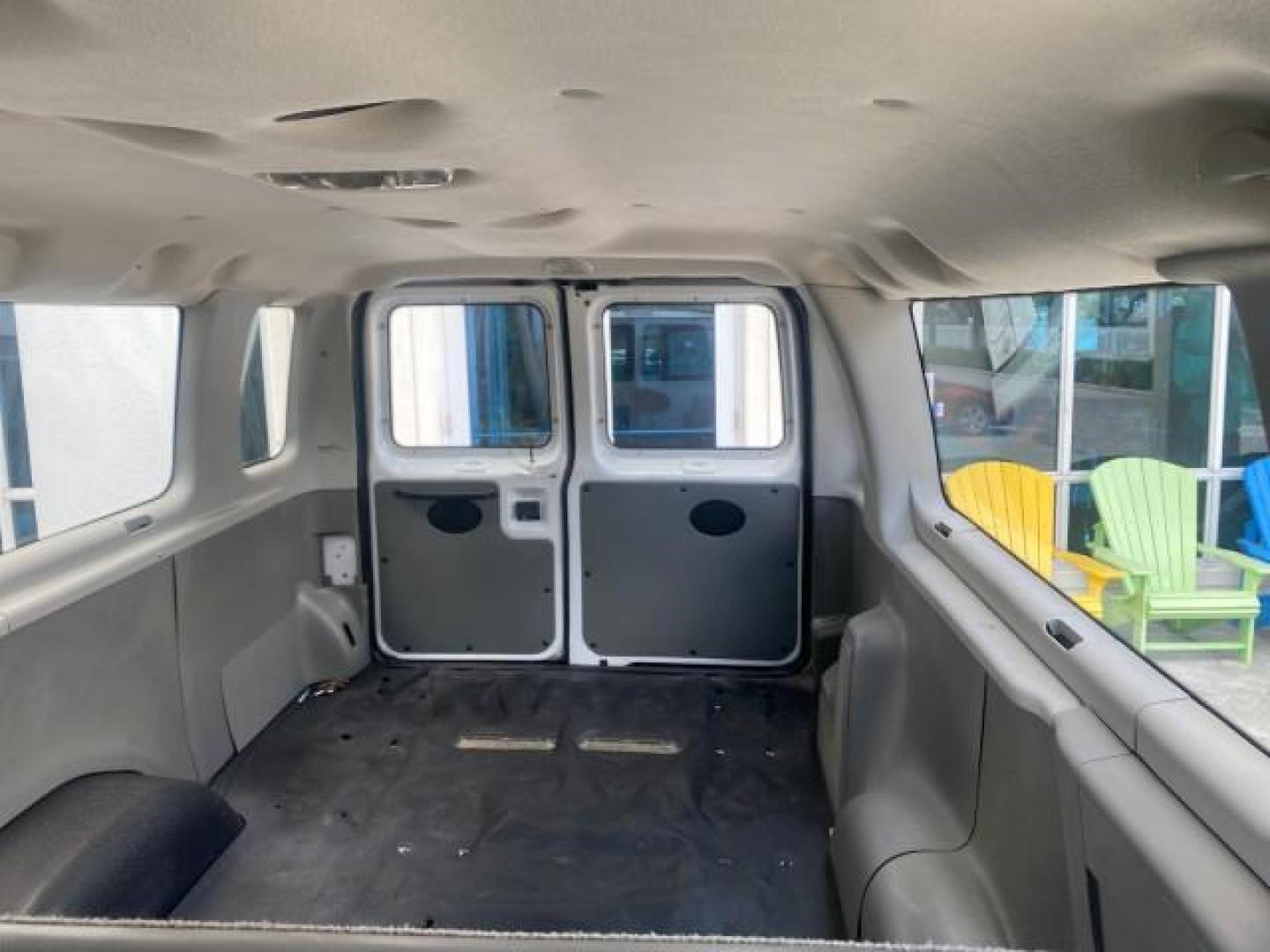 2005 Oxford White /Medium Flint Ford Econoline Wagon 5 PASSENGER XL LOW MILES 49,408 (1FBSS31L05H) with an 5.4L EFI V8 Engine engine, Automatic transmission, located at 4701 North Dixie Hwy, Pompano Beach, FL, 33064, (954) 422-2889, 26.240938, -80.123474 - OUR WEBPAGE FLORIDACARS1.COM HAS OVER 100 PHOTOS AND FREE CARFAX LINK 2005 FORD E-SERIES E-350 SD XLT 5PASSENGER VIN: 1FBSS31L05HA95671 1 F B S S 3 1 L 0 5 H A 9 5 6 7 1 VAN 5.4L V8 F GASOLINE REAR WHEEL DRIVE Top Features Rear Air Conditioning Third Row Seat Vinyl Seats Basic Features ABS Brakes AM - Photo#61