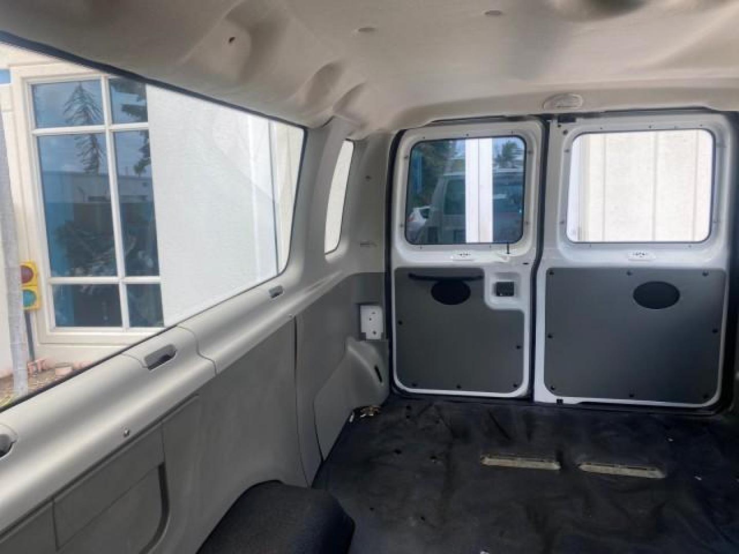 2005 Oxford White /Medium Flint Ford Econoline Wagon 5 PASSENGER XL LOW MILES 49,408 (1FBSS31L05H) with an 5.4L EFI V8 Engine engine, Automatic transmission, located at 4701 North Dixie Hwy, Pompano Beach, FL, 33064, (954) 422-2889, 26.240938, -80.123474 - OUR WEBPAGE FLORIDACARS1.COM HAS OVER 100 PHOTOS AND FREE CARFAX LINK 2005 FORD E-SERIES E-350 SD XLT 5PASSENGER VIN: 1FBSS31L05HA95671 1 F B S S 3 1 L 0 5 H A 9 5 6 7 1 VAN 5.4L V8 F GASOLINE REAR WHEEL DRIVE Top Features Rear Air Conditioning Third Row Seat Vinyl Seats Basic Features ABS Brakes AM - Photo#65