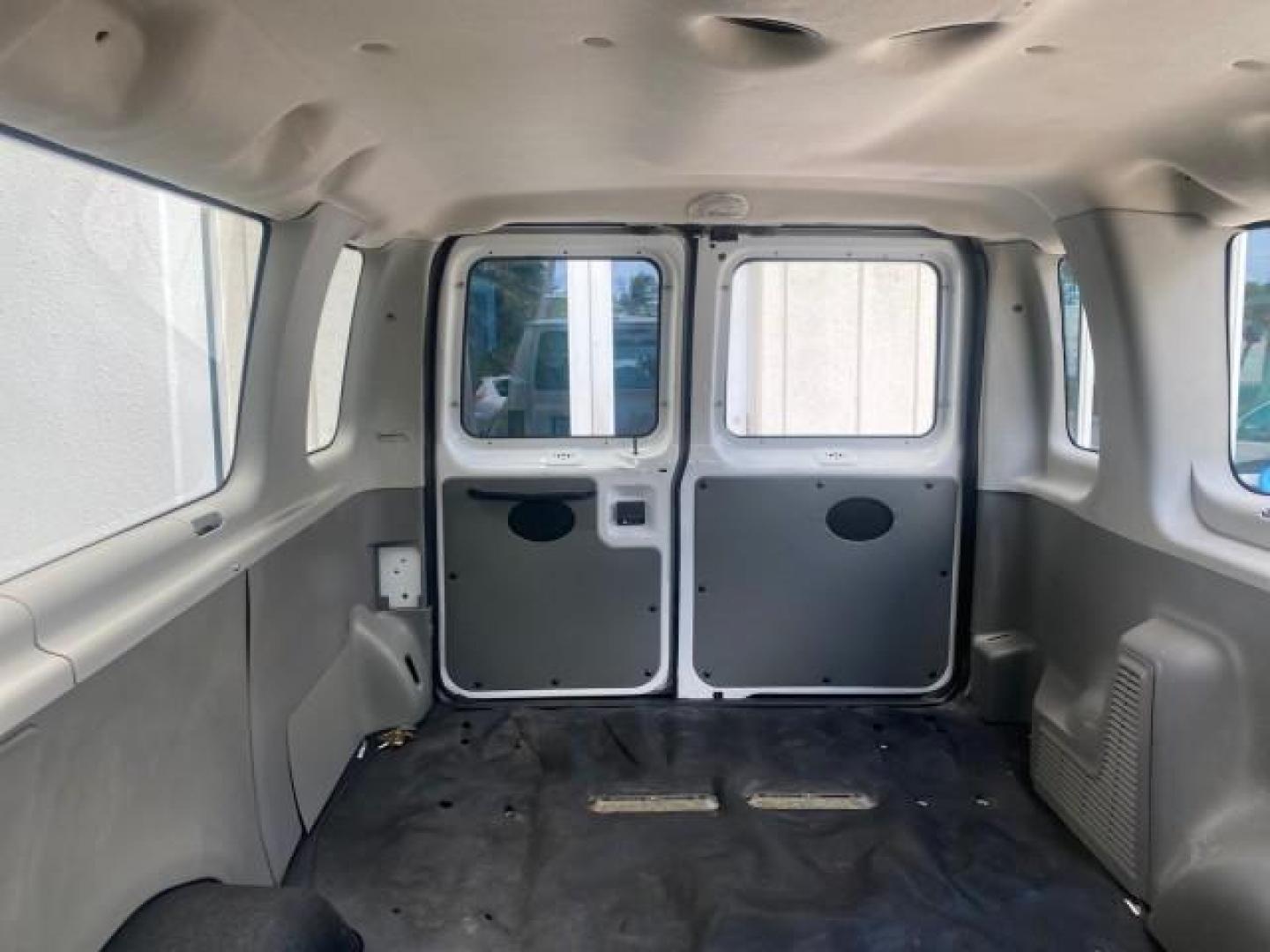 2005 Oxford White /Medium Flint Ford Econoline Wagon 5 PASSENGER XL LOW MILES 49,408 (1FBSS31L05H) with an 5.4L EFI V8 Engine engine, Automatic transmission, located at 4701 North Dixie Hwy, Pompano Beach, FL, 33064, (954) 422-2889, 26.240938, -80.123474 - OUR WEBPAGE FLORIDACARS1.COM HAS OVER 100 PHOTOS AND FREE CARFAX LINK 2005 FORD E-SERIES E-350 SD XLT 5PASSENGER VIN: 1FBSS31L05HA95671 1 F B S S 3 1 L 0 5 H A 9 5 6 7 1 VAN 5.4L V8 F GASOLINE REAR WHEEL DRIVE Top Features Rear Air Conditioning Third Row Seat Vinyl Seats Basic Features ABS Brakes AM - Photo#66
