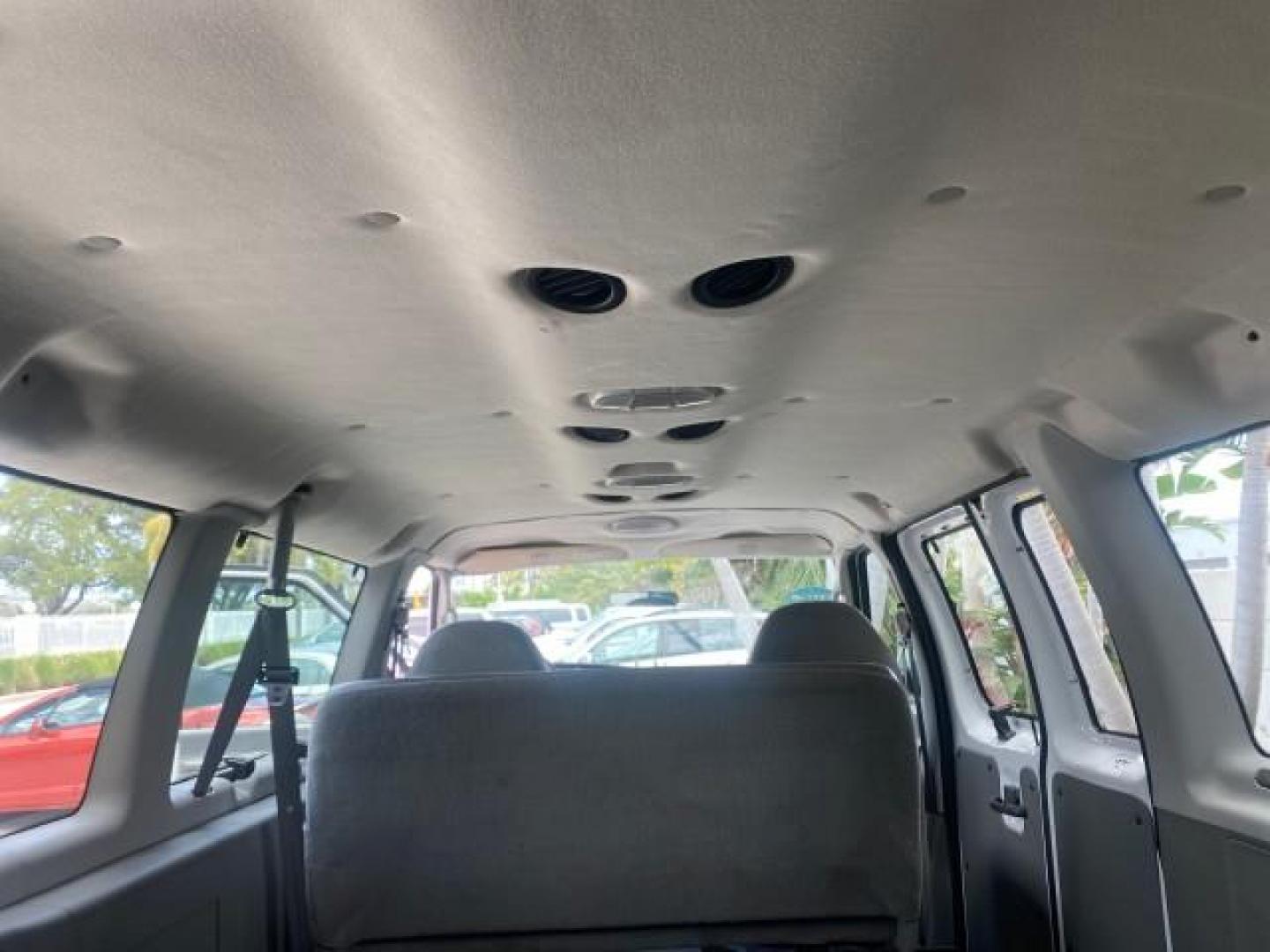 2005 Oxford White /Medium Flint Ford Econoline Wagon 5 PASSENGER XL LOW MILES 49,408 (1FBSS31L05H) with an 5.4L EFI V8 Engine engine, Automatic transmission, located at 4701 North Dixie Hwy, Pompano Beach, FL, 33064, (954) 422-2889, 26.240938, -80.123474 - OUR WEBPAGE FLORIDACARS1.COM HAS OVER 100 PHOTOS AND FREE CARFAX LINK 2005 FORD E-SERIES E-350 SD XLT 5PASSENGER VIN: 1FBSS31L05HA95671 1 F B S S 3 1 L 0 5 H A 9 5 6 7 1 VAN 5.4L V8 F GASOLINE REAR WHEEL DRIVE Top Features Rear Air Conditioning Third Row Seat Vinyl Seats Basic Features ABS Brakes AM - Photo#70