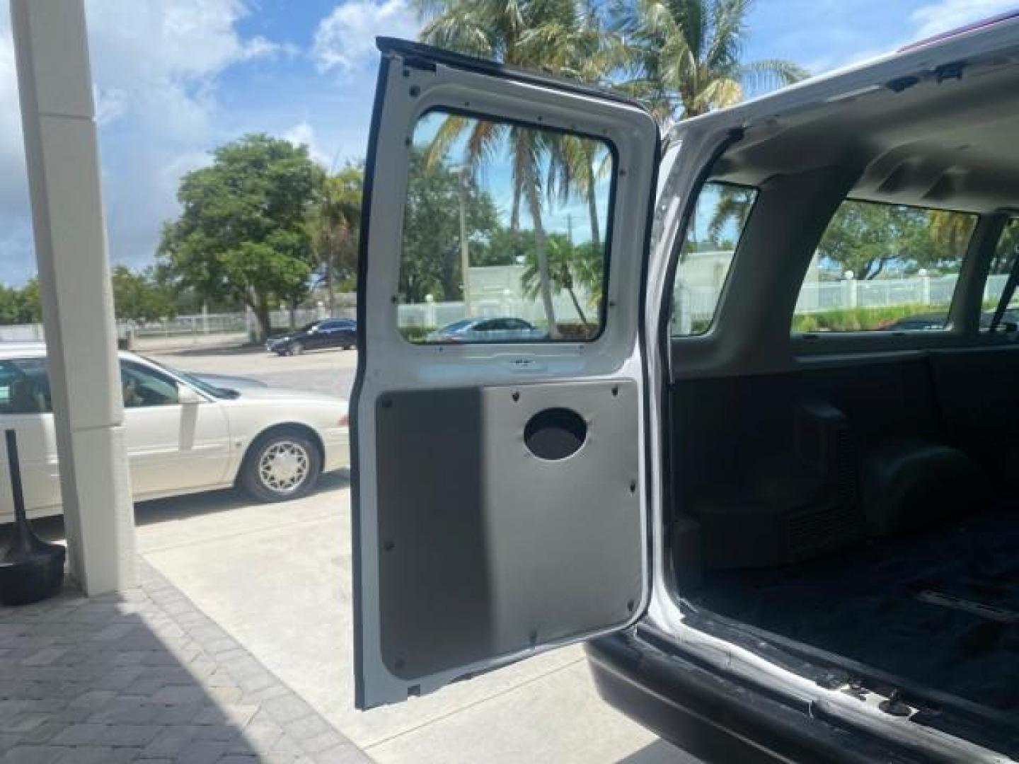 2005 Oxford White /Medium Flint Ford Econoline Wagon 5 PASSENGER XL LOW MILES 49,408 (1FBSS31L05H) with an 5.4L EFI V8 Engine engine, Automatic transmission, located at 4701 North Dixie Hwy, Pompano Beach, FL, 33064, (954) 422-2889, 26.240938, -80.123474 - OUR WEBPAGE FLORIDACARS1.COM HAS OVER 100 PHOTOS AND FREE CARFAX LINK 2005 FORD E-SERIES E-350 SD XLT 5PASSENGER VIN: 1FBSS31L05HA95671 1 F B S S 3 1 L 0 5 H A 9 5 6 7 1 VAN 5.4L V8 F GASOLINE REAR WHEEL DRIVE Top Features Rear Air Conditioning Third Row Seat Vinyl Seats Basic Features ABS Brakes AM - Photo#84